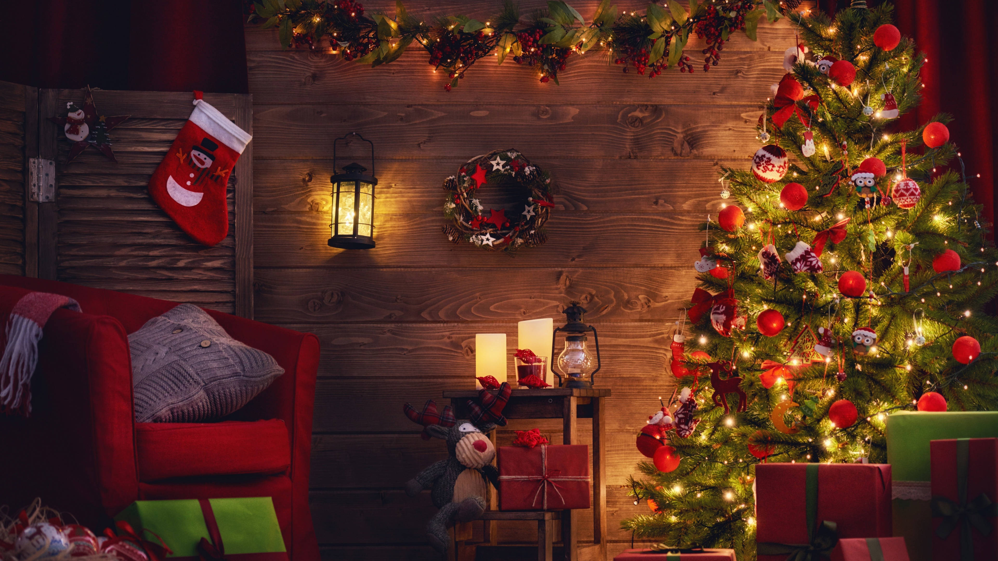 cozy rustic living room, glowing tree, red stockings, 4K Desktop Wallpaper