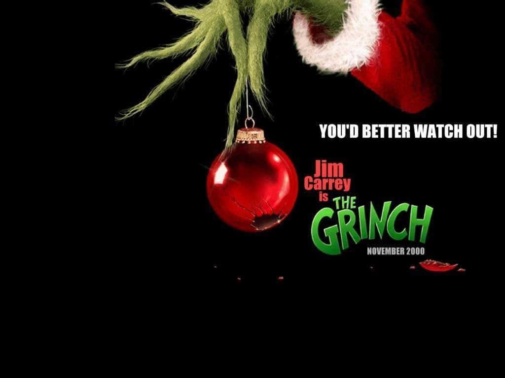 Grinch, red Santa hat, cracked red ornament, SD Desktop Wallpaper