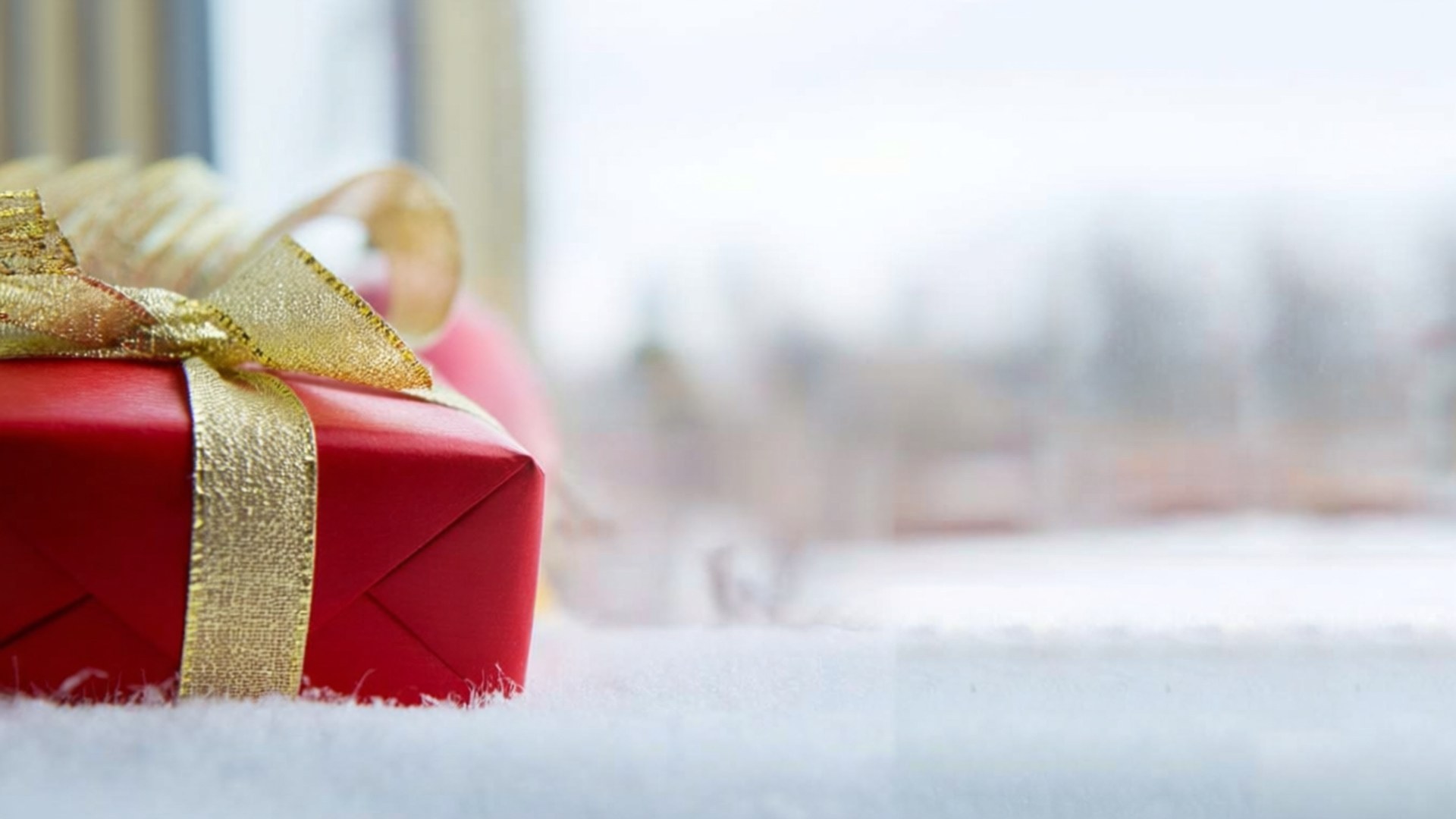 red gift box, gold bow, snowy ground, Full HD Desktop Wallpaper