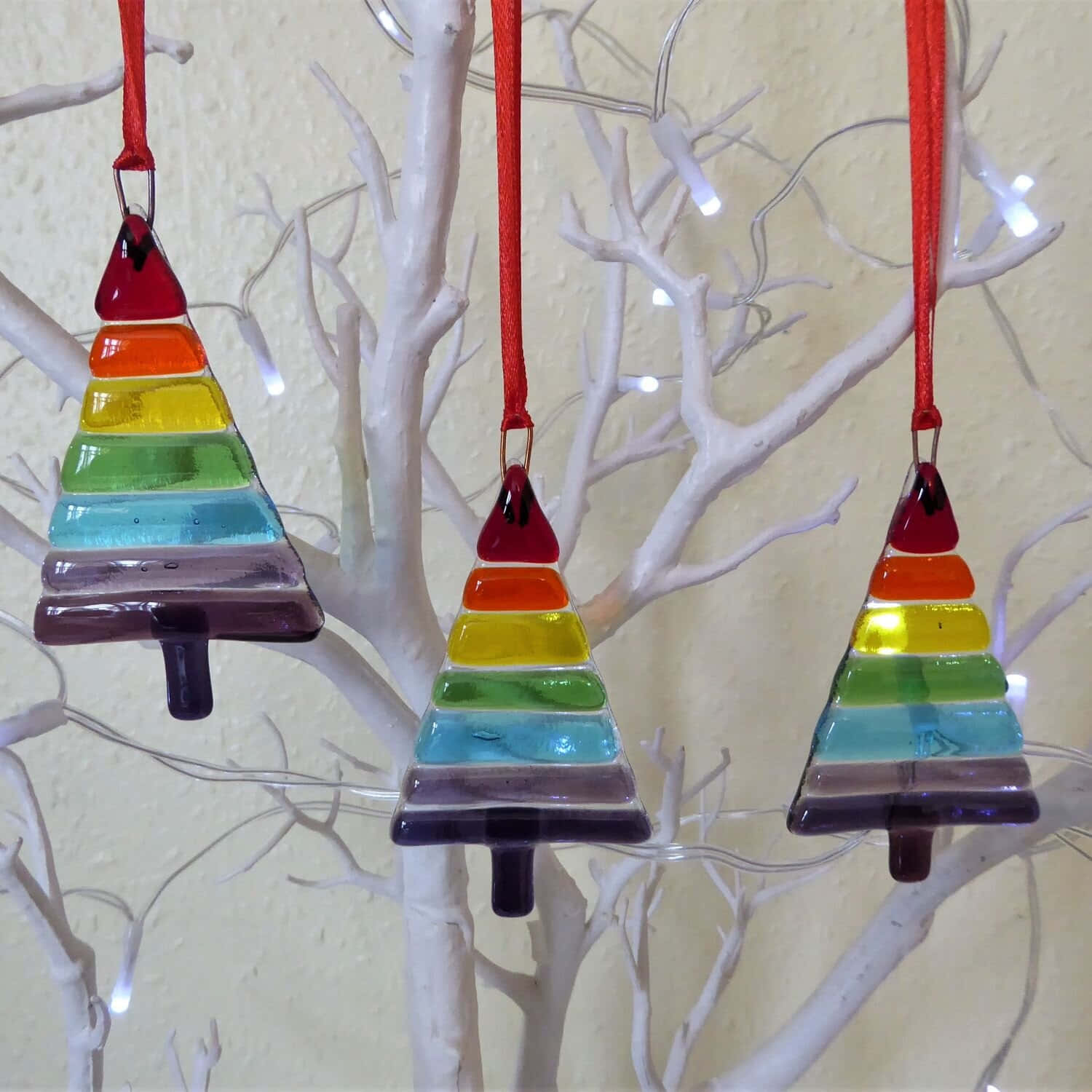 rainbow-colored glass Christmas tree ornaments, red ribbons, white decorative branch, HD Desktop Wallpaper