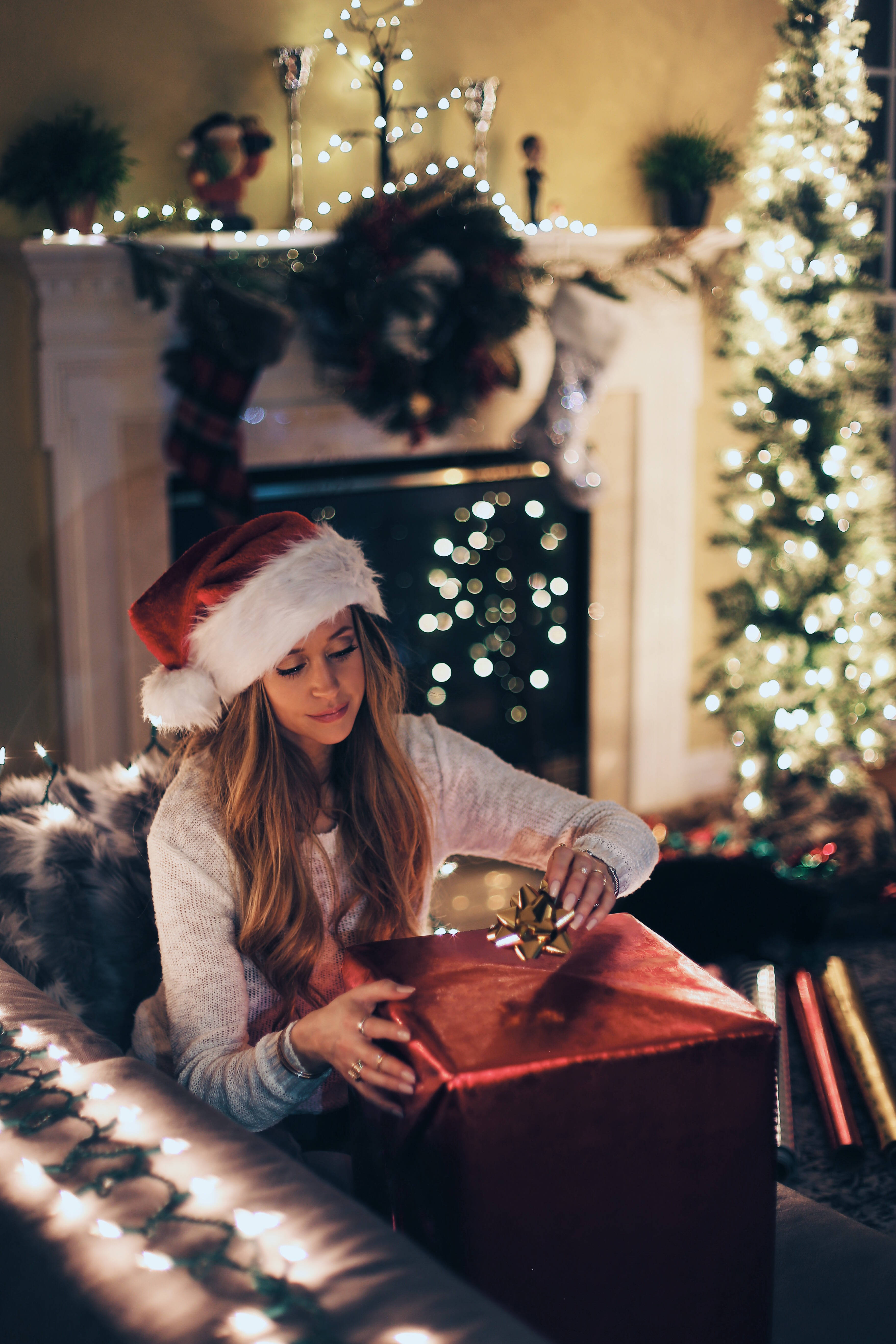 Santa hat, red gift, glowing Christmas tree, 5K Phone Wallpaper