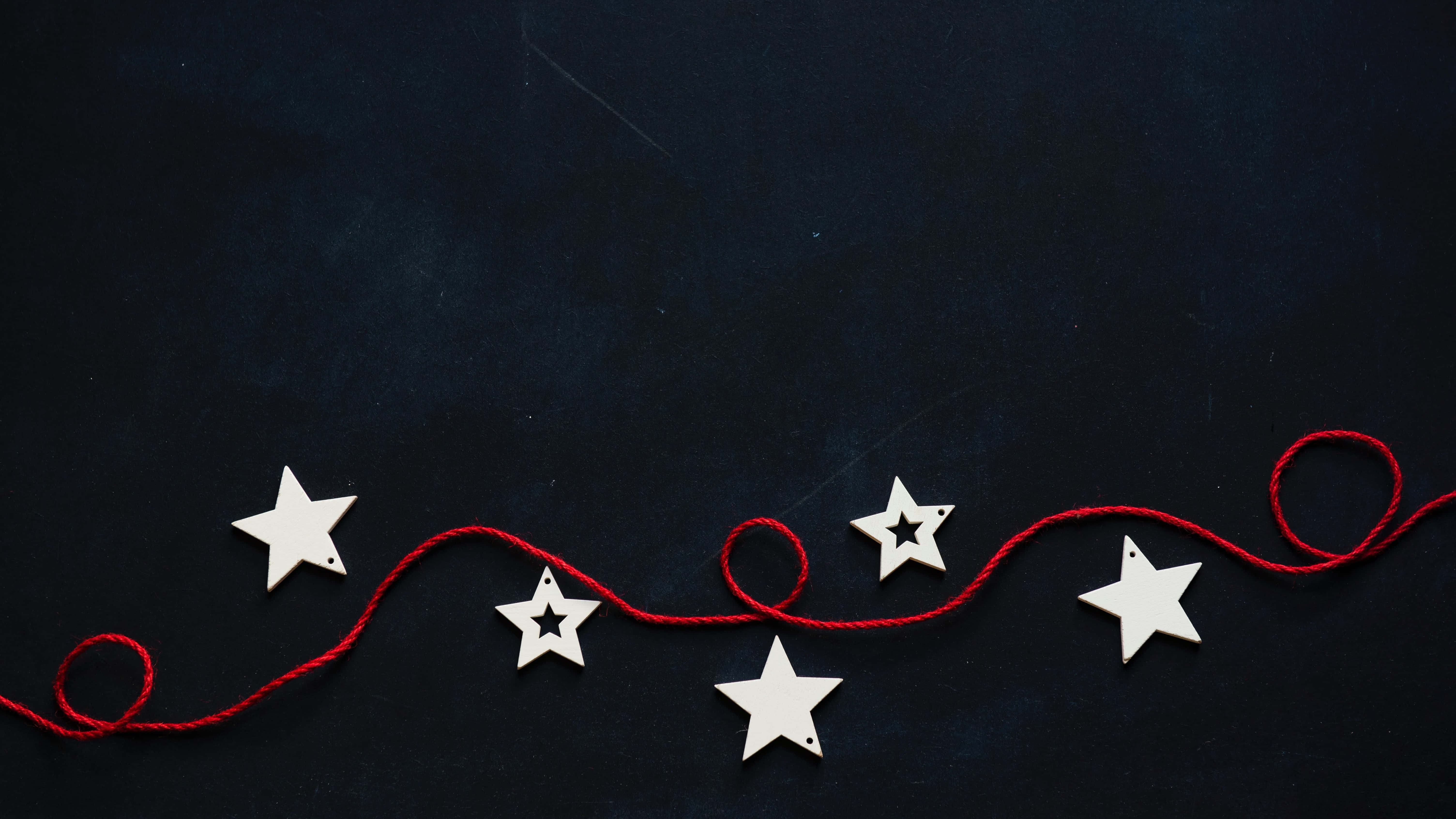 white wooden stars, red yarn, black background, 5K Desktop Wallpaper