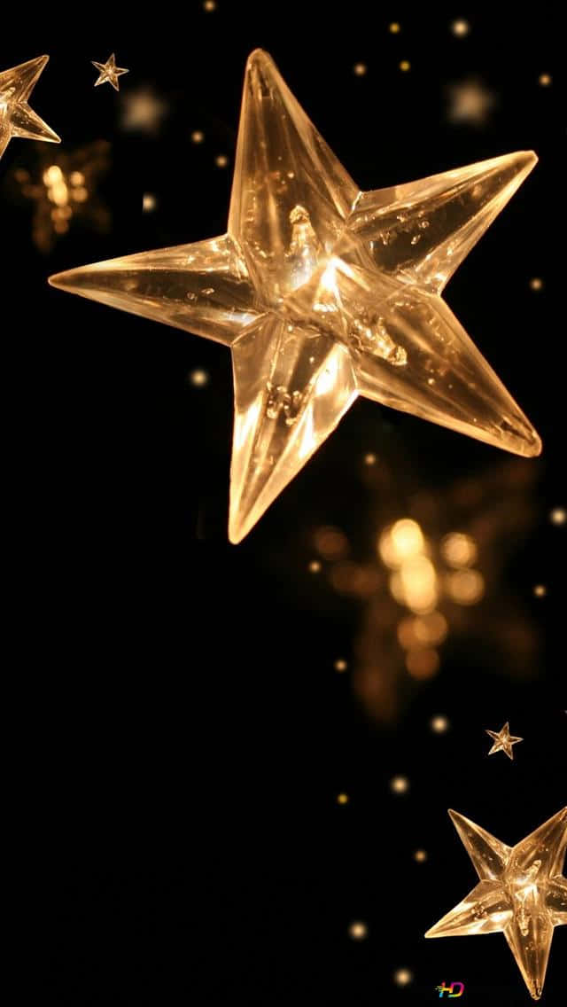 Christmas Star, glowing golden star ornament, dark backdrop, SD Phone Wallpaper