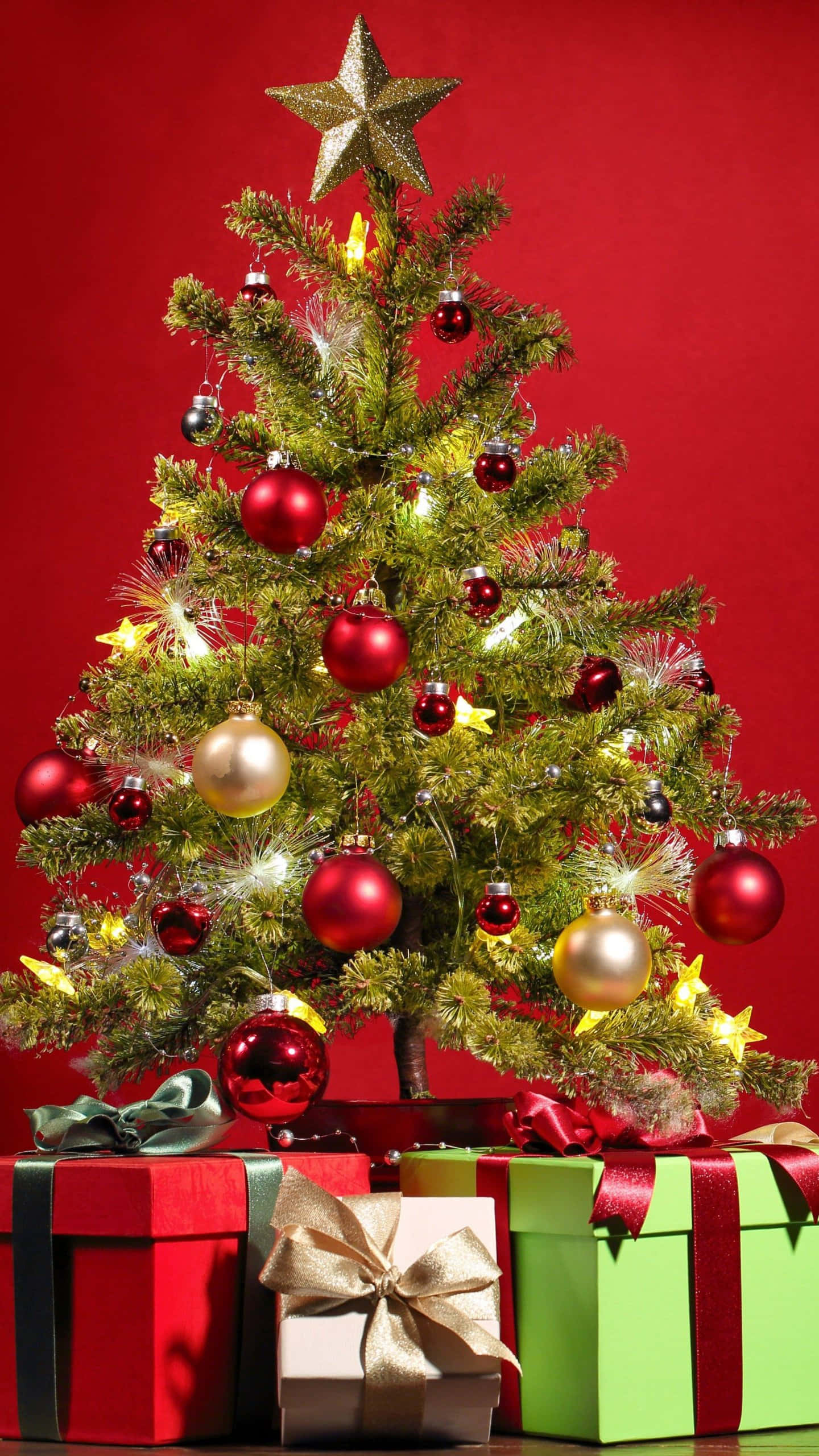 Christmas tree, red and gold ornaments, star topper, 2K Phone Wallpaper