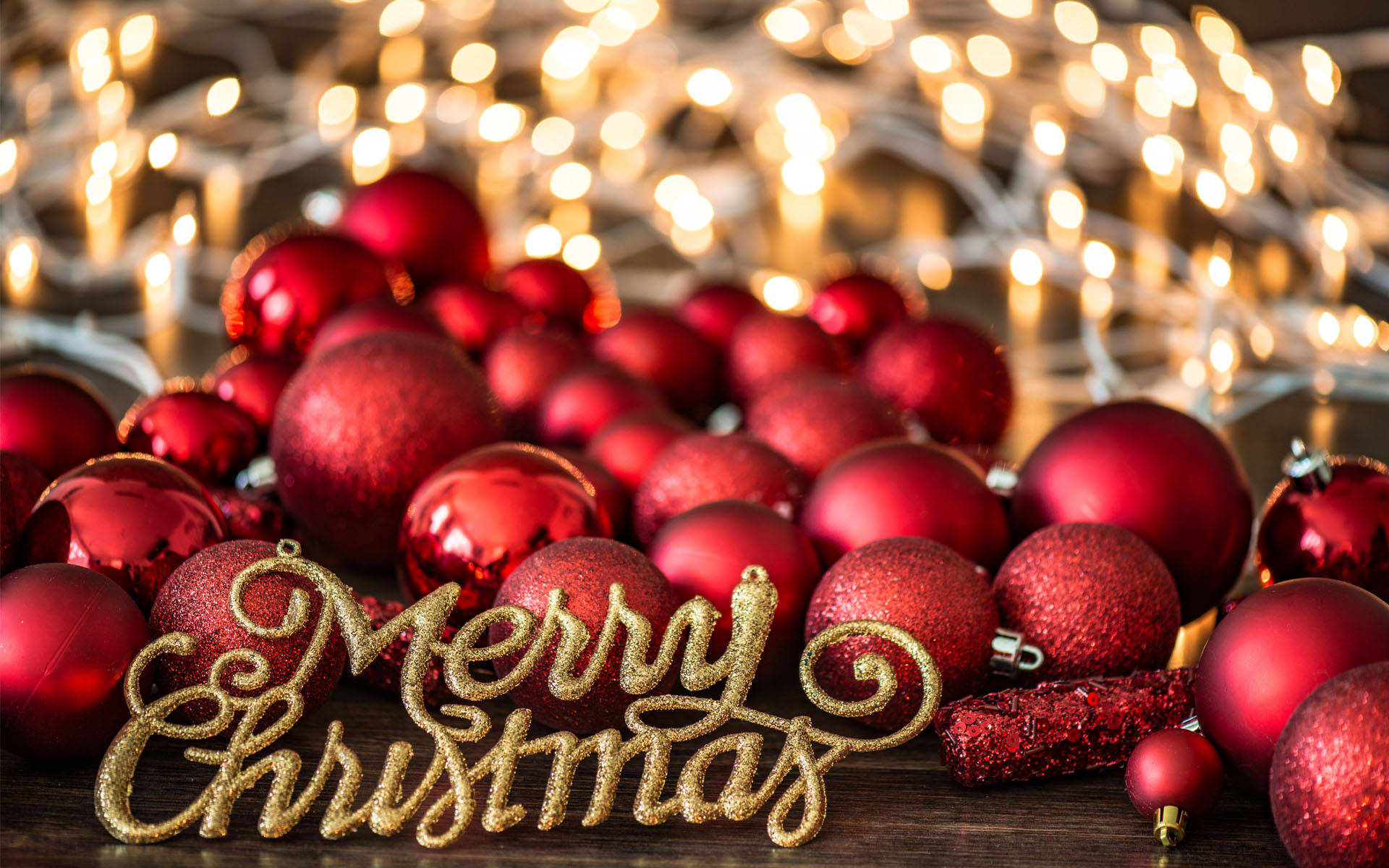 Snowy Widescreen Background, Shiny red Christmas ornaments, Glittering 'Merry Christmas' sign, Full HD Desktop Wallpaper