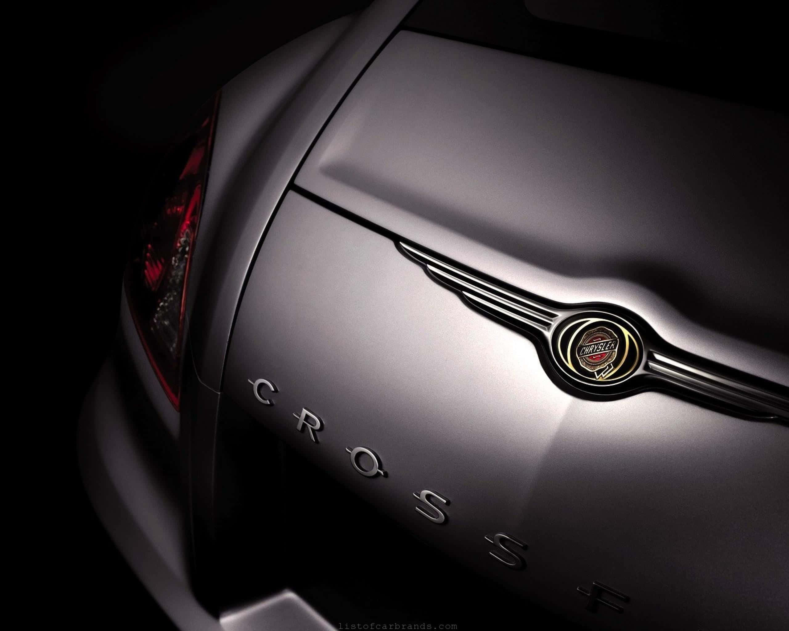 2004 Chrysler Crossfire, sleek silver, glowing red taillight, 2K Desktop Wallpaper
