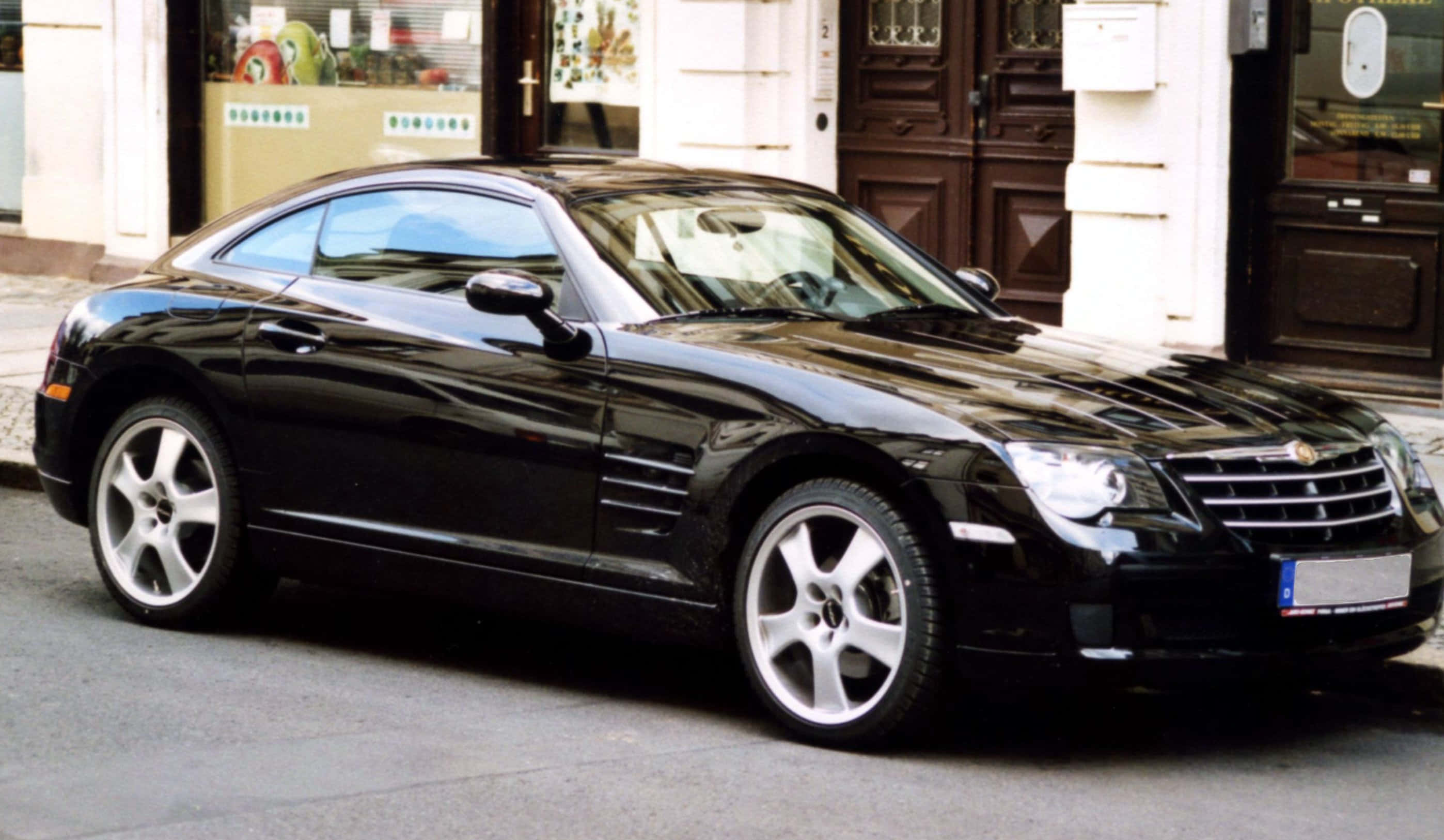 Chrysler Crossfire, sleek black, city street, 2K Desktop Wallpaper