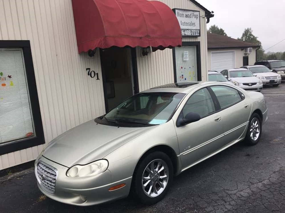 Chrysler LHS, silver sedan, beige building, SD Desktop Wallpaper