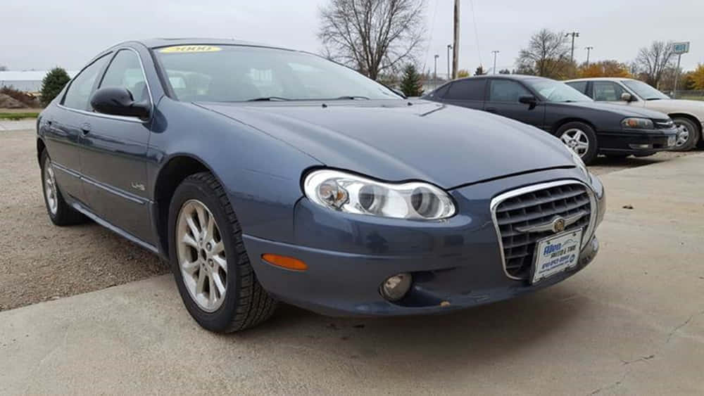 Chrysler Lhs, blue, gravel lot, SD Desktop Wallpaper