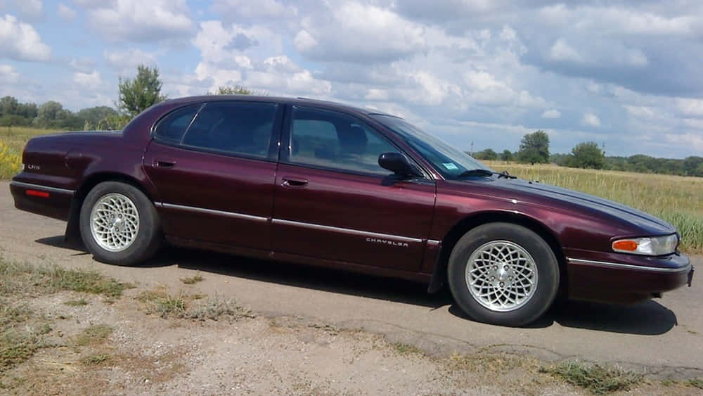 Chrysler LHS, maroon, gravel road, SD Desktop Wallpaper