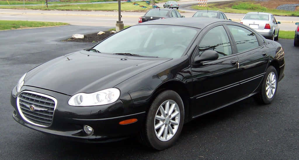 Chrysler LHS, sleek black, wet asphalt lot, SD Desktop Wallpaper