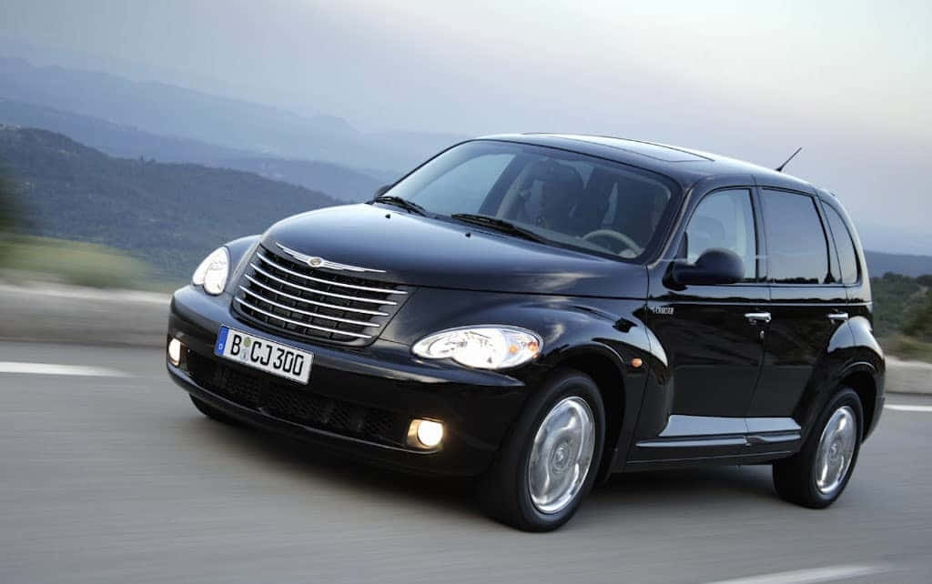 Chrysler PT Cruiser, black, winding mountain road, SD Desktop Wallpaper