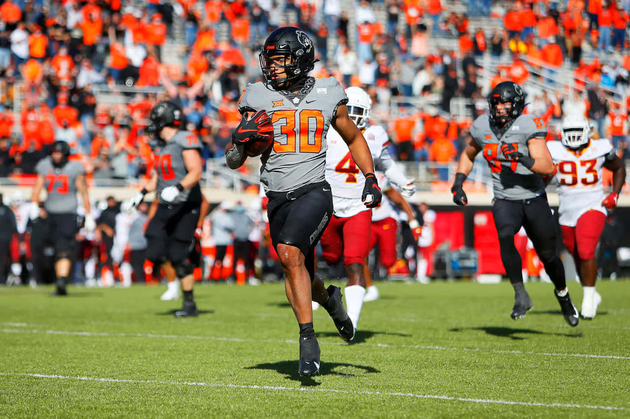 Chuba Hubbard, gray and orange uniform, sunlit green field, HD Desktop Wallpaper