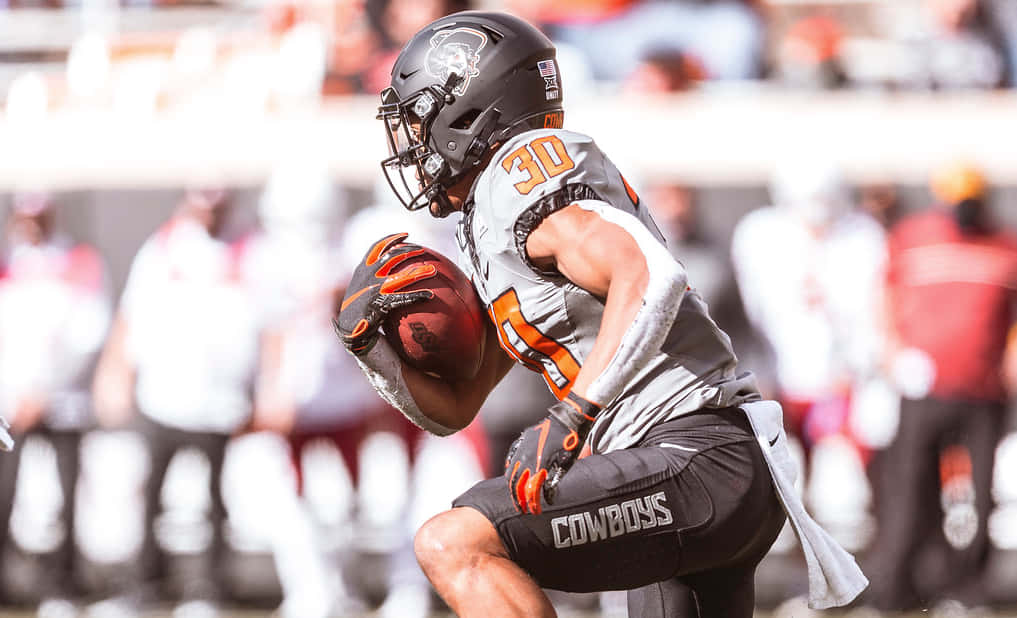 Chuba Hubbard, black and orange uniform, running back, SD Desktop Wallpaper