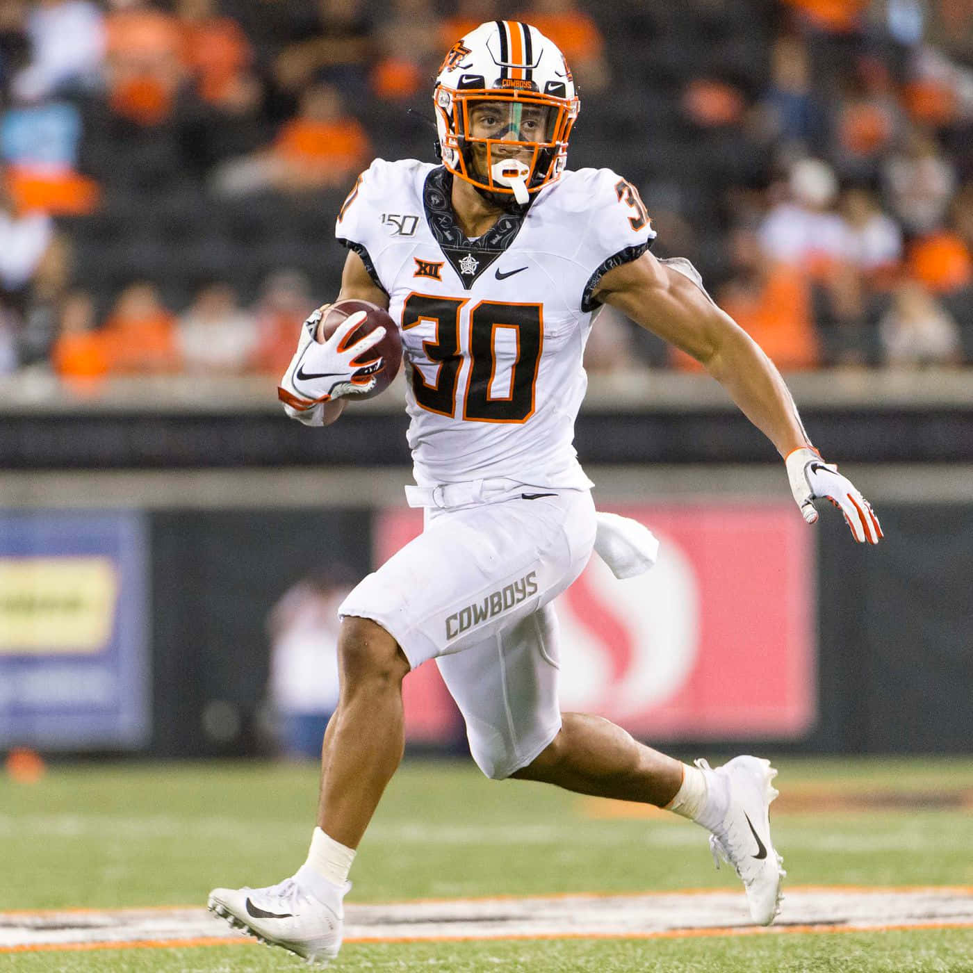 Chuba Hubbard, white and orange uniform, night game, HD Desktop Wallpaper