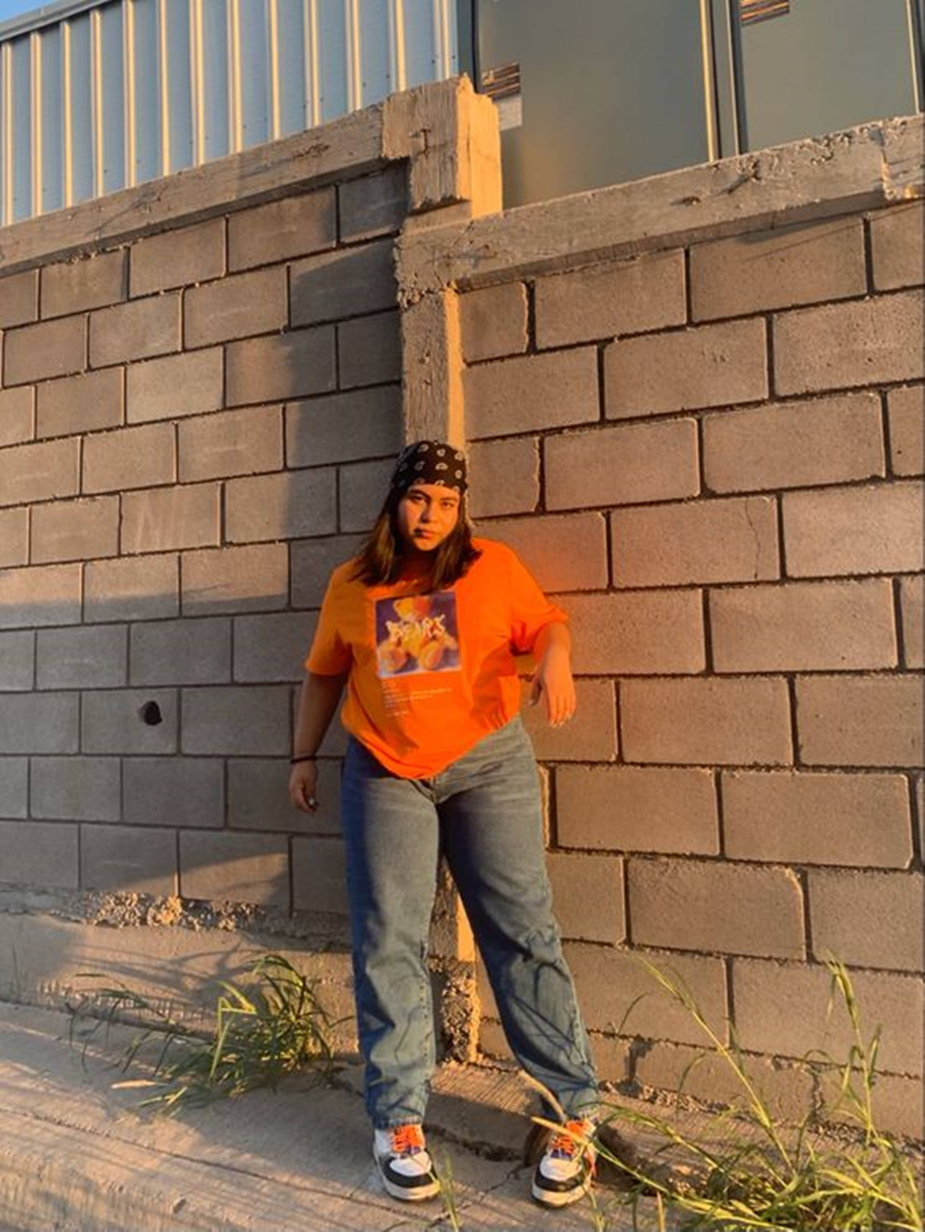 chubby teen, orange shirt, jeans, Full HD Phone Wallpaper