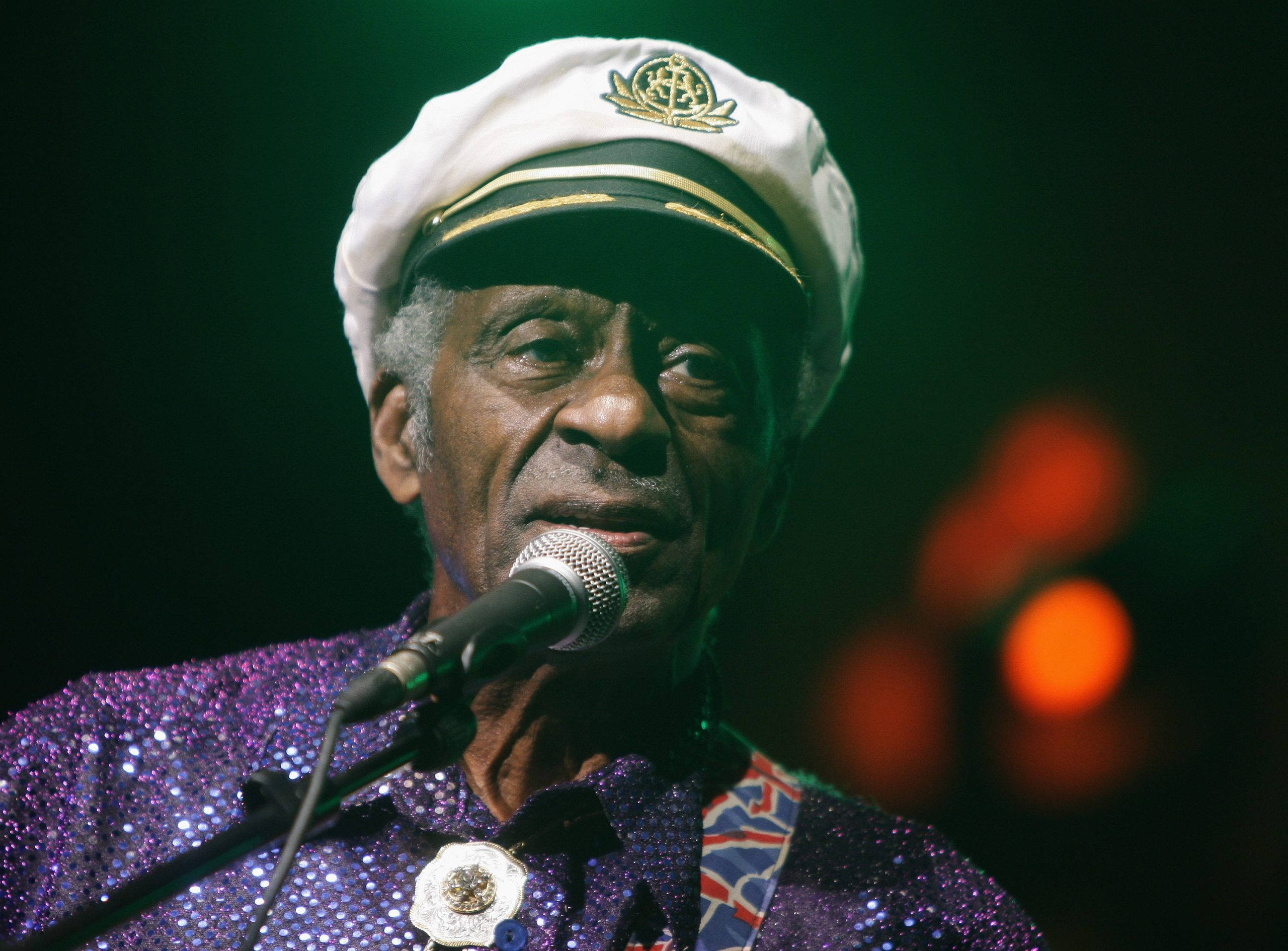 Chuck Berry, white sailor hat, glittering purple shirt, 2K Desktop Wallpaper