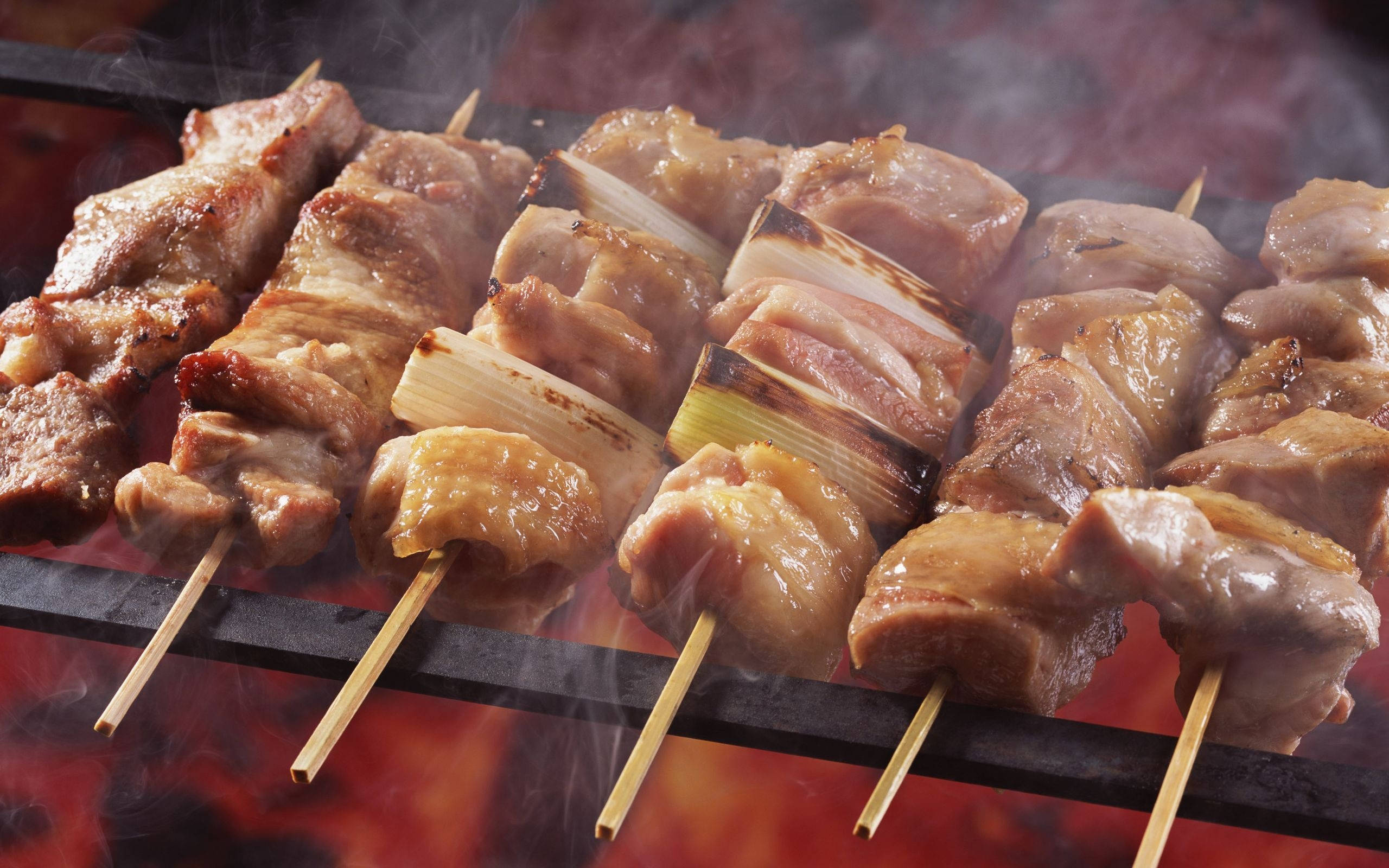 Churrasco, skewers, glowing embers, 2K Desktop Wallpaper