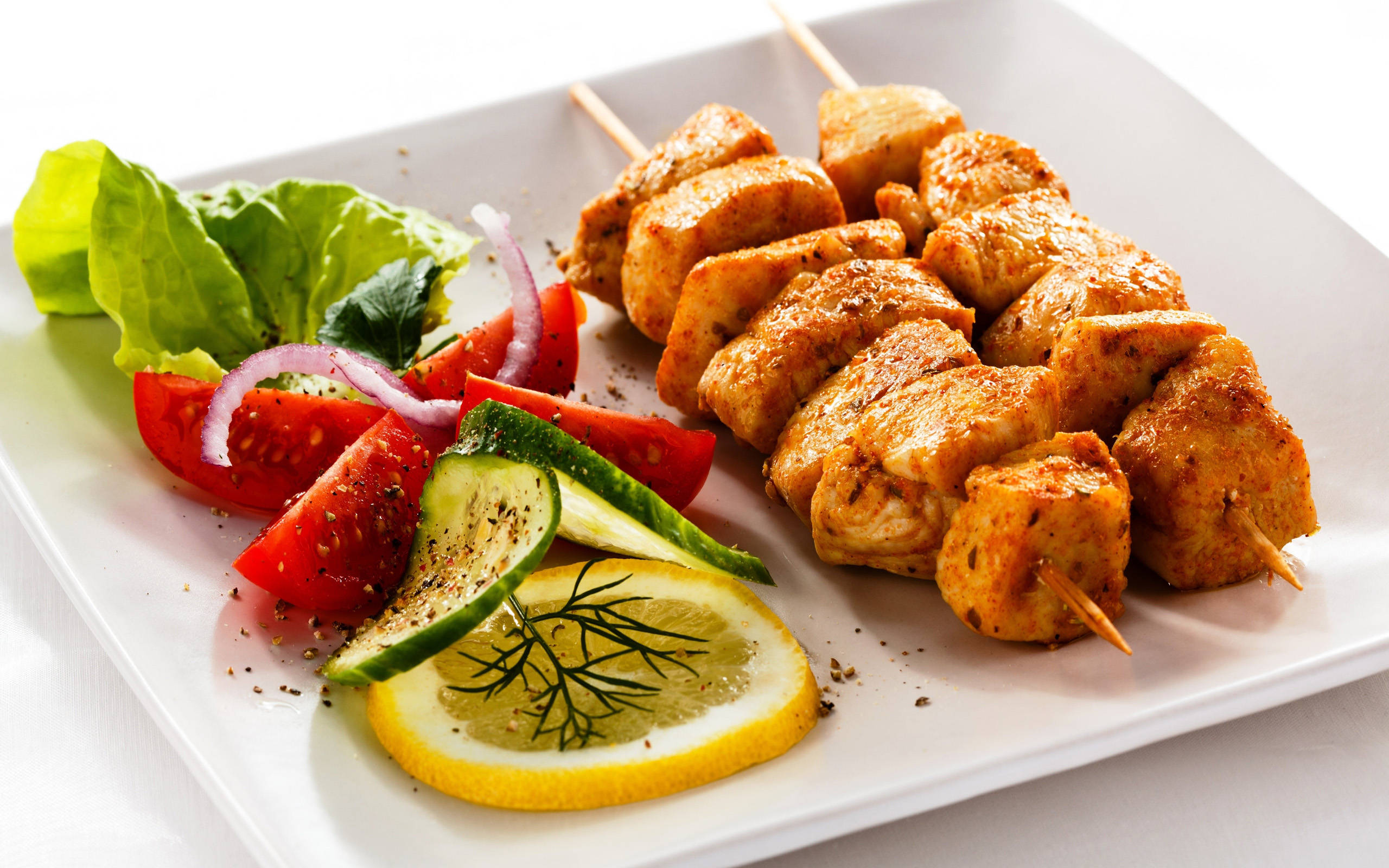 Churrasco, fresh green salad, golden chicken skewers, 2K Desktop Wallpaper