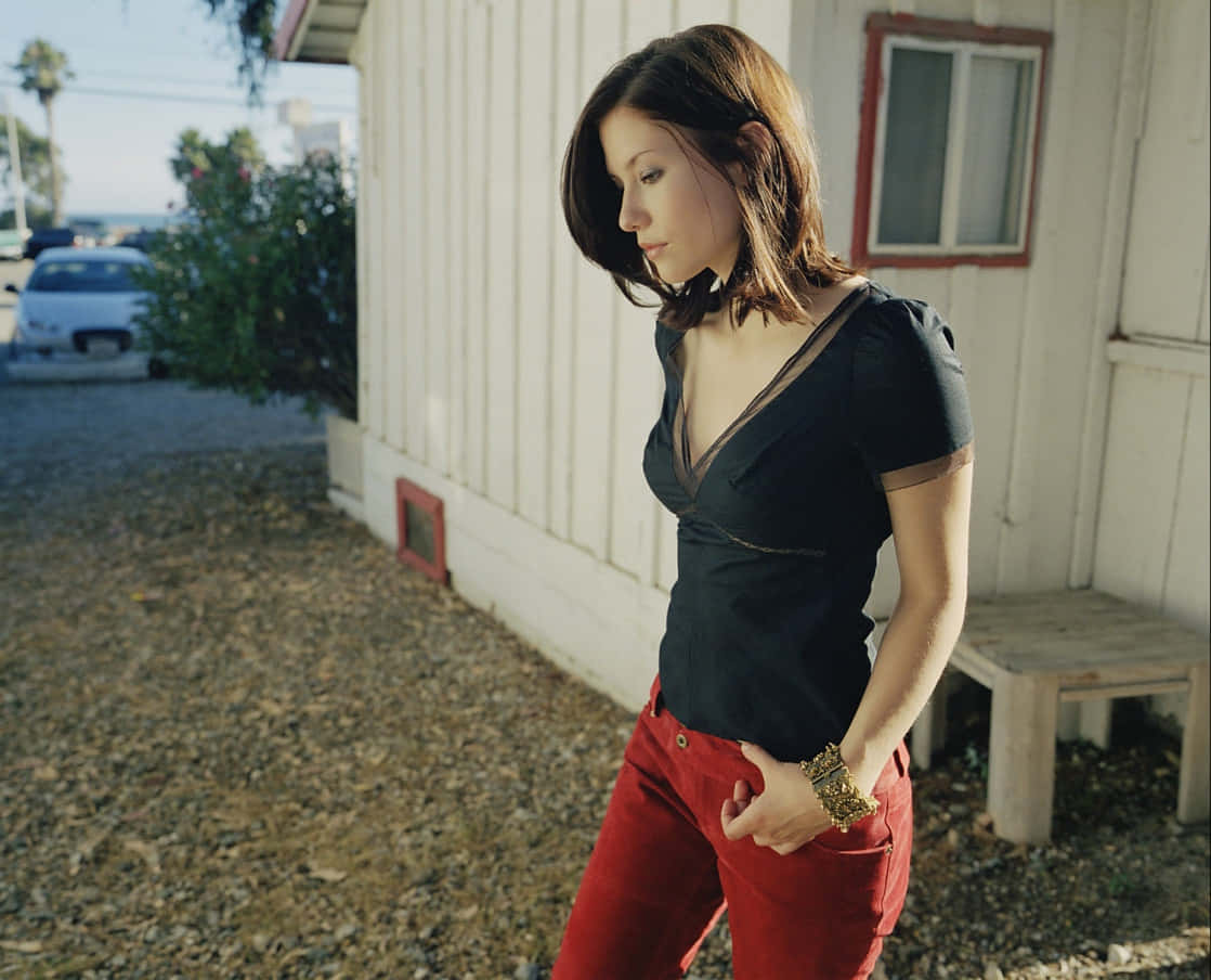 Chyler Leigh, red pants, black top, SD Desktop Wallpaper
