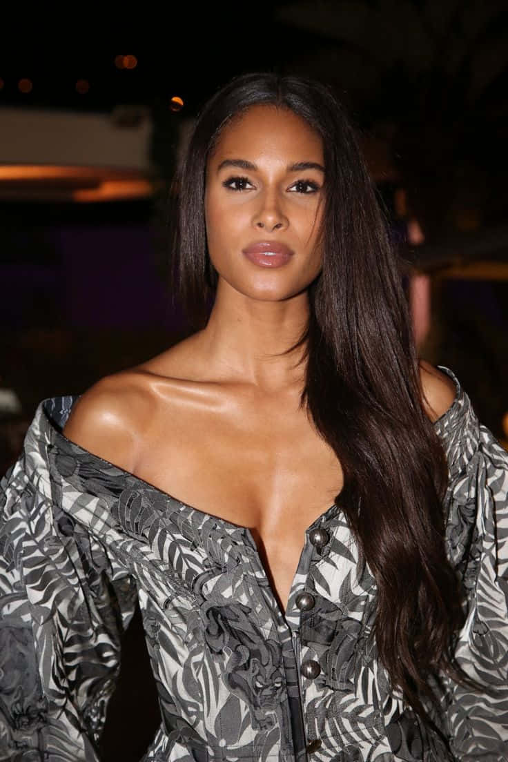 Cindy Bruna, off-shoulder patterned dress, warm nighttime lights, SD Phone Wallpaper