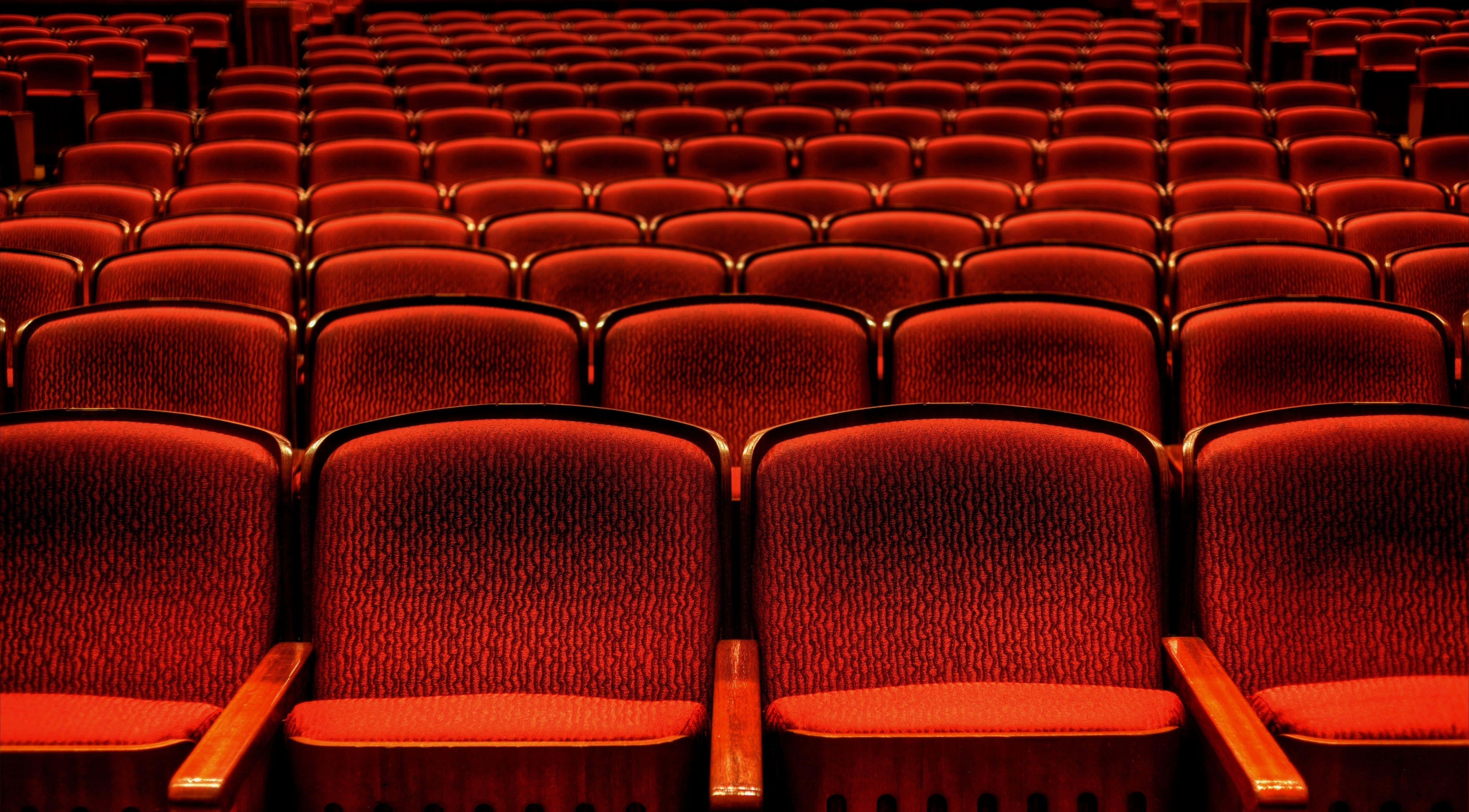 red velvet theater seats, wooden armrests, rows of empty seats, 5K Desktop Wallpaper