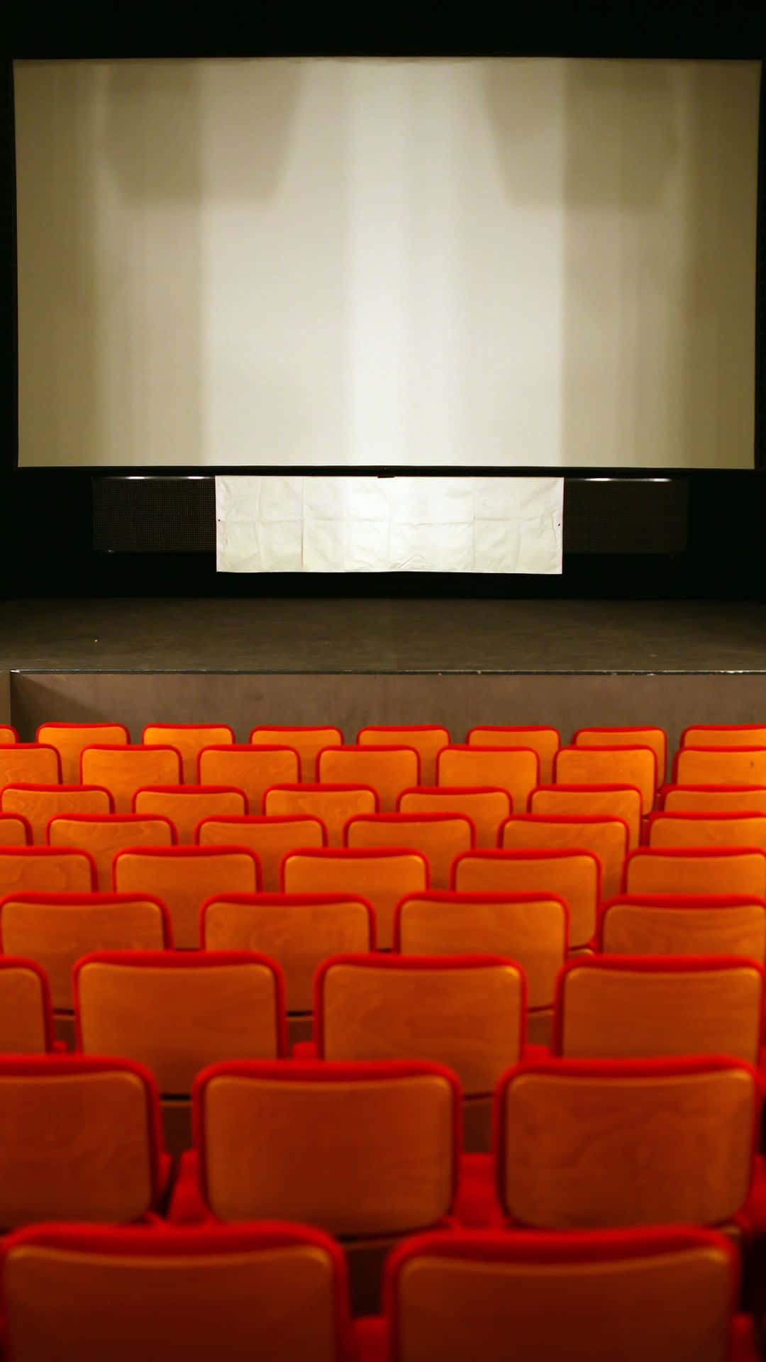 Cinema, red seats, blank movie screen, Full HD Phone Wallpaper