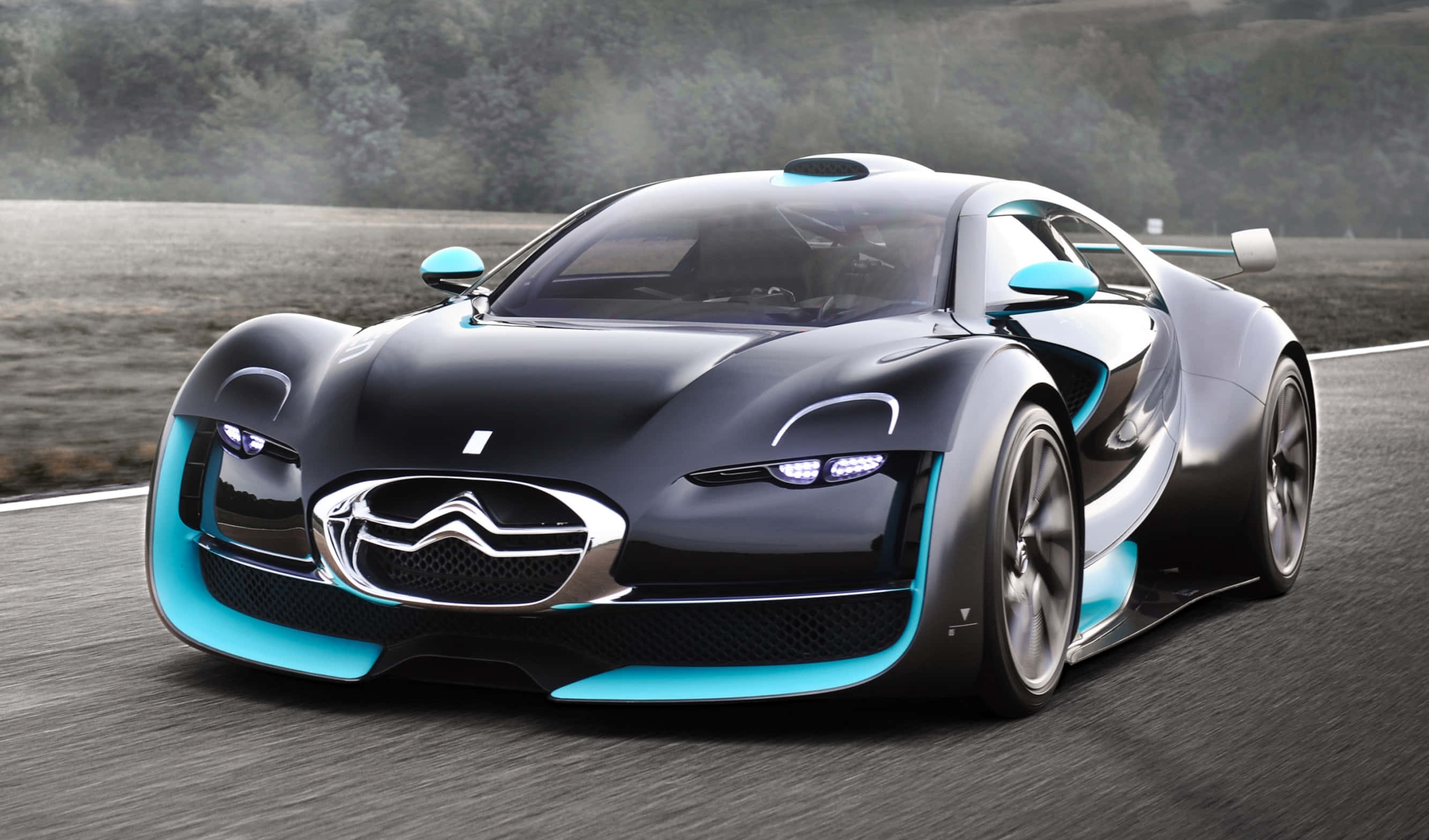 Citroen DS Survolt, sleek black and cyan, winding road, 2K Desktop Wallpaper