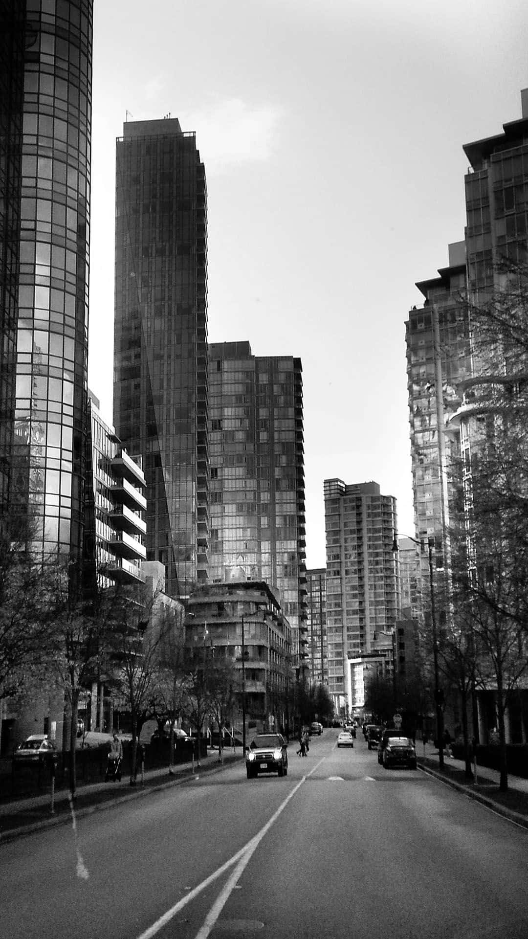 City iPhone, black and white urban street, towering glass skyscrapers, Full HD Phone Wallpaper