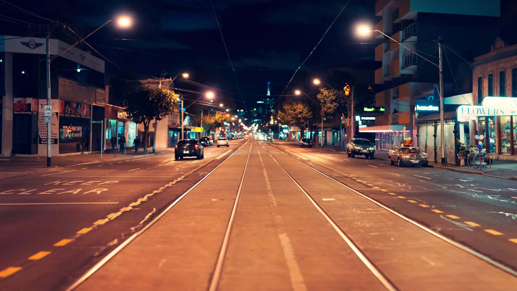 urban nightlife, tramlined boulevard, warm streetlights, Full HD Desktop Wallpaper