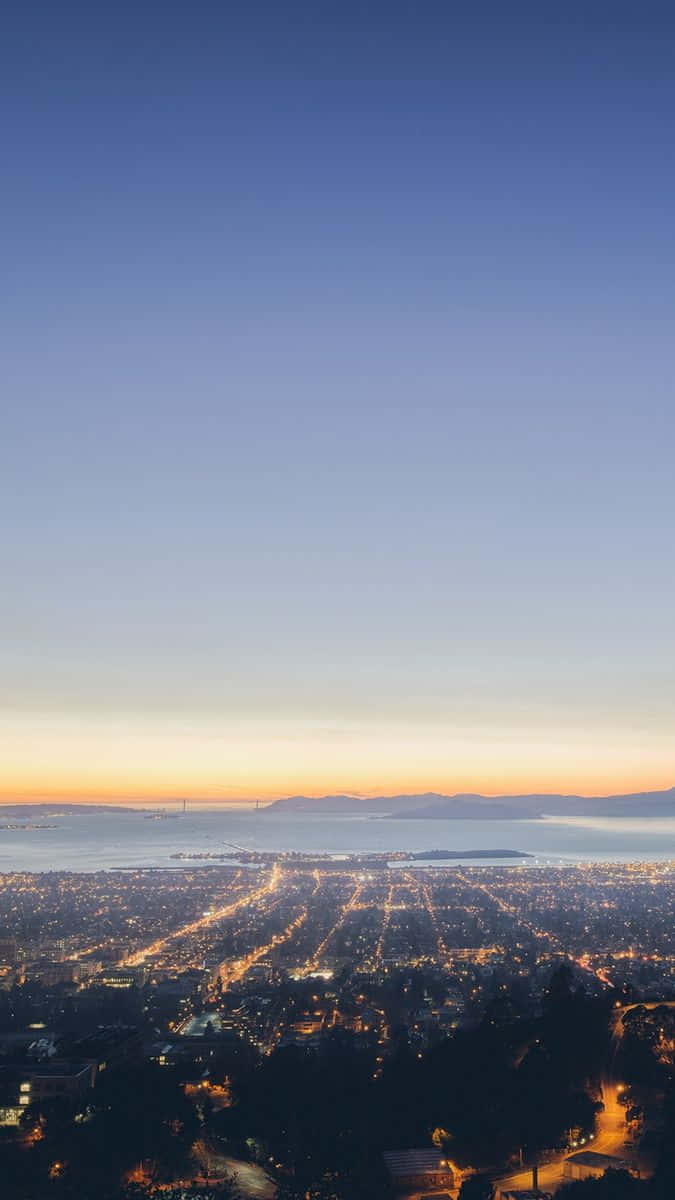 City Sunset iPhone, golden glow, setting sun, SD Phone Wallpaper