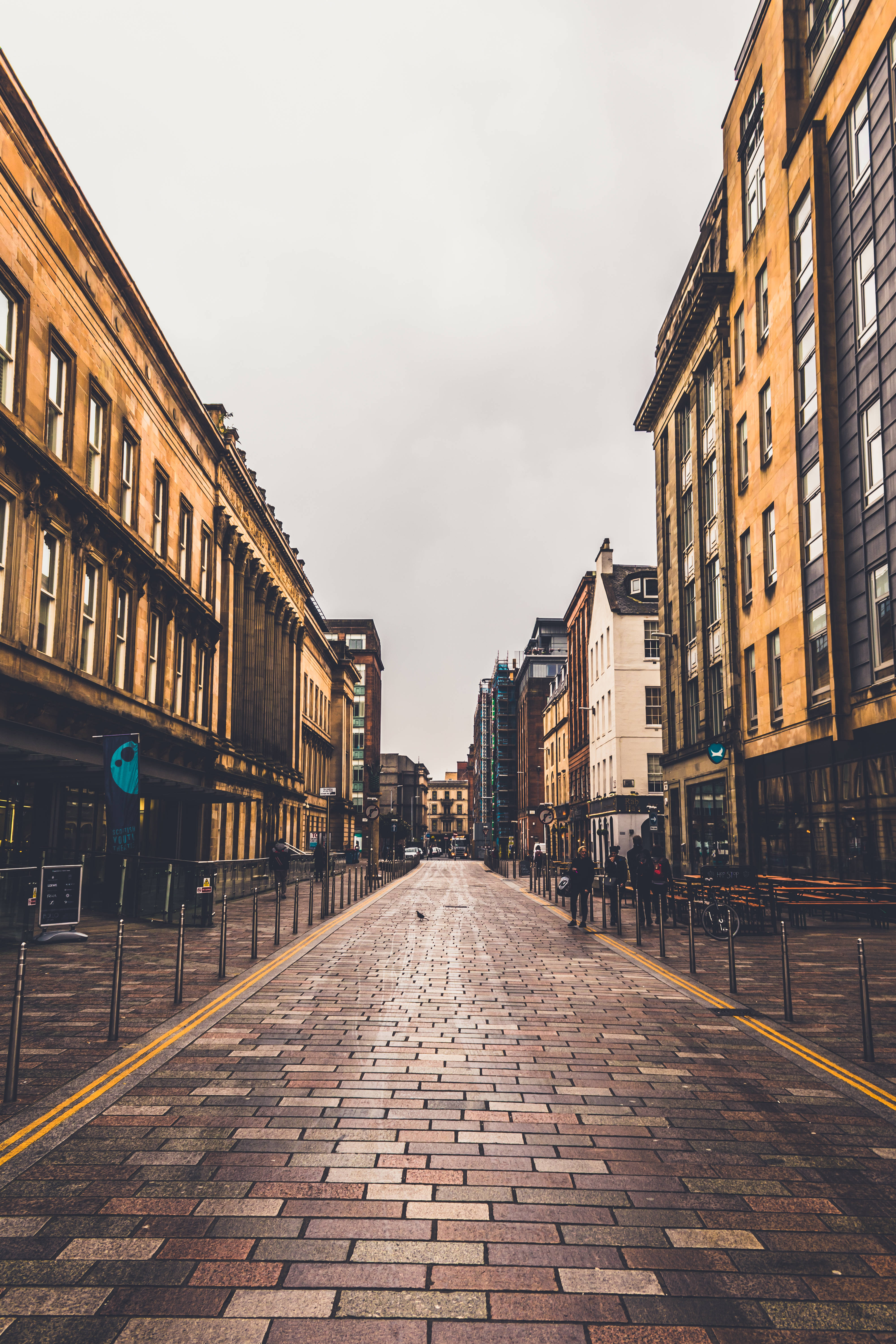 twilight glow, modern cityscape, wet cobblestone street, 5K Phone Wallpaper
