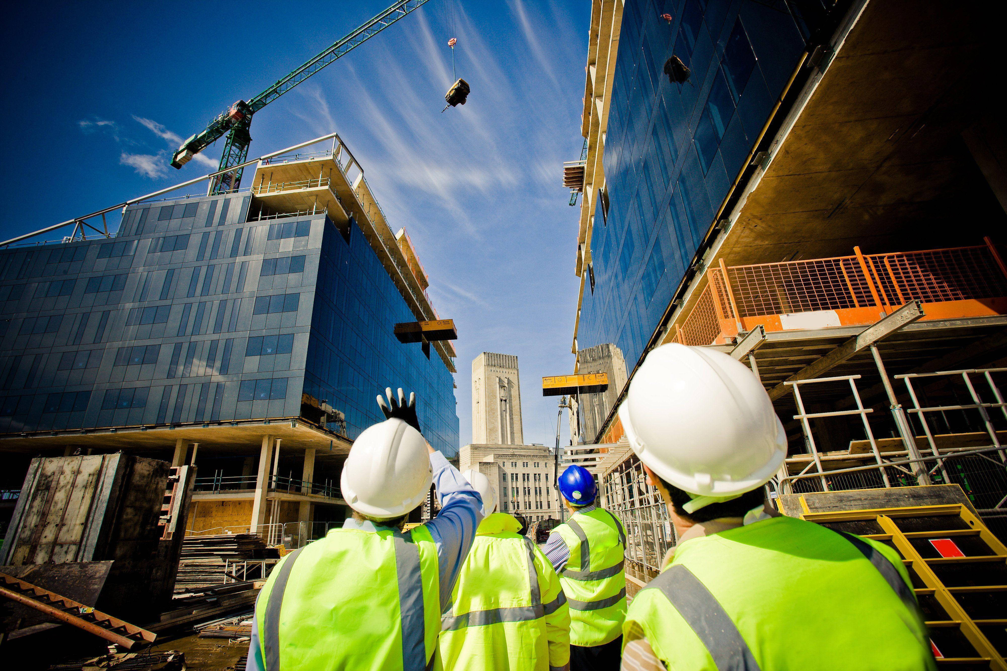 bright yellow vests, white hard hats, bustling urban site, 4K Desktop Wallpaper