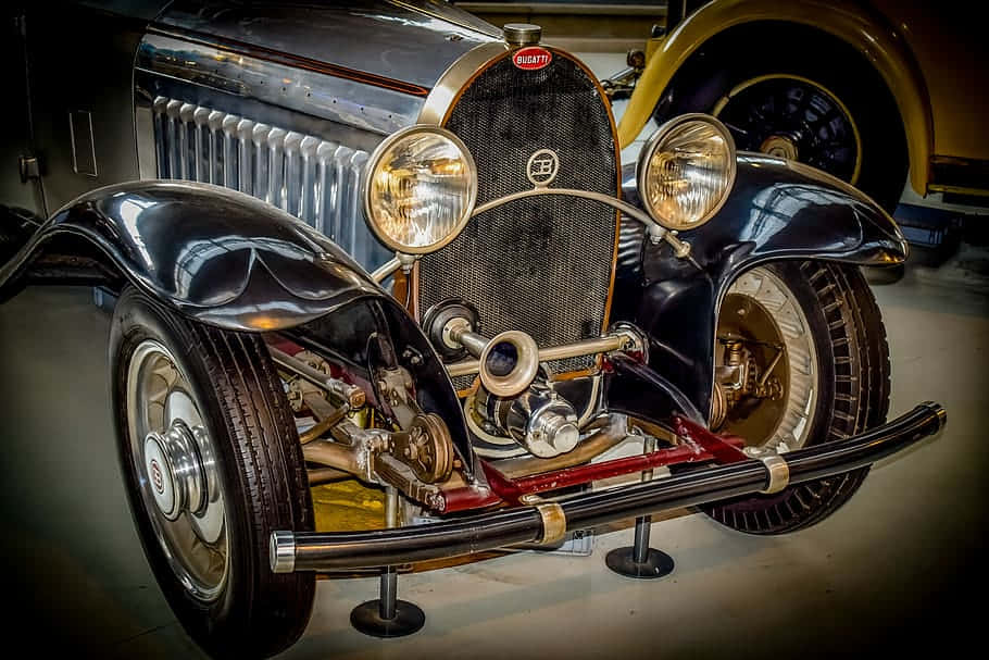 vintage Bugatti, chrome accents, exposed mechanical details, SD Desktop Wallpaper