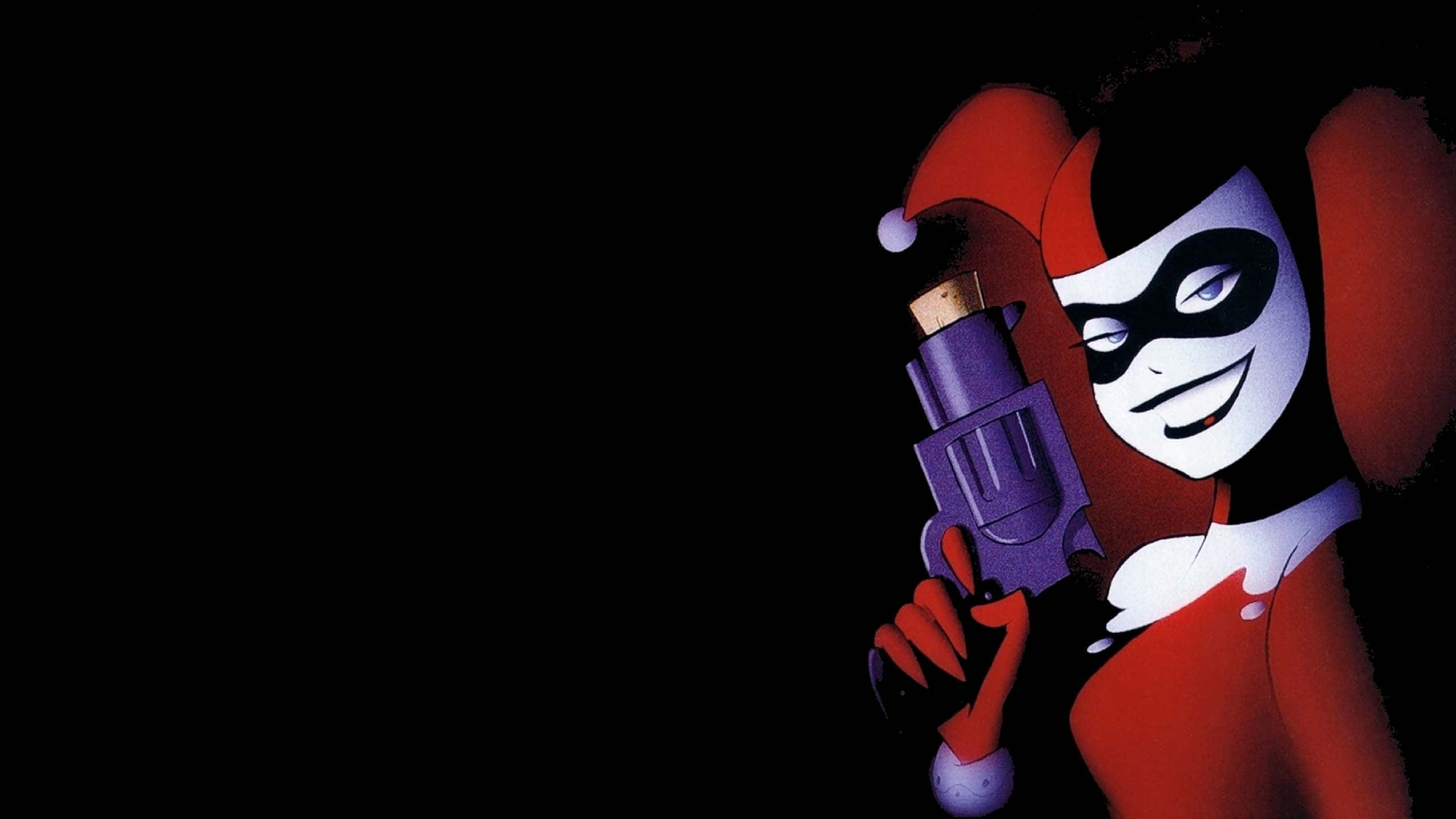 Classic Harley Quinn, red and white jester outfit, purple revolver, 2K Desktop Wallpaper