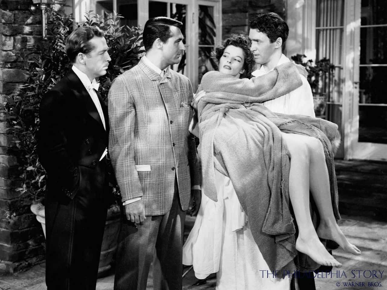black and white film still, man carrying a woman, woman wrapped in a blanket, HD Desktop Wallpaper