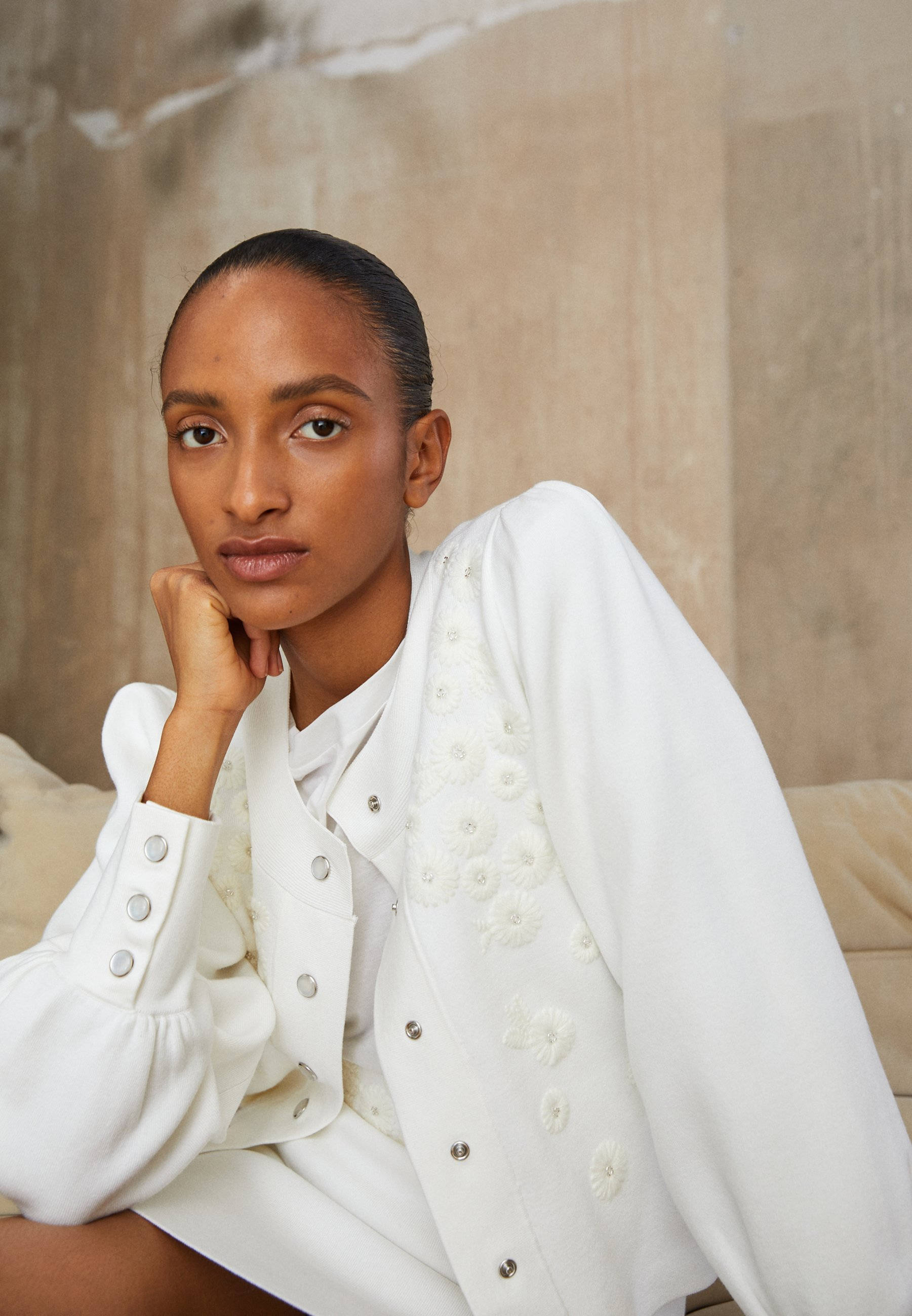 Claudie Pierlot, white flower embroidered blazer, textured beige wall, 2K Phone Wallpaper