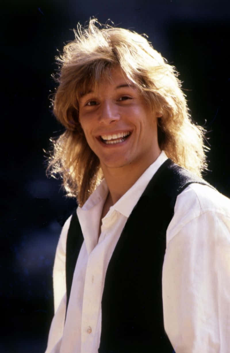 Claudio Caniggia, voluminous blonde hair, white shirt, SD Phone Wallpaper