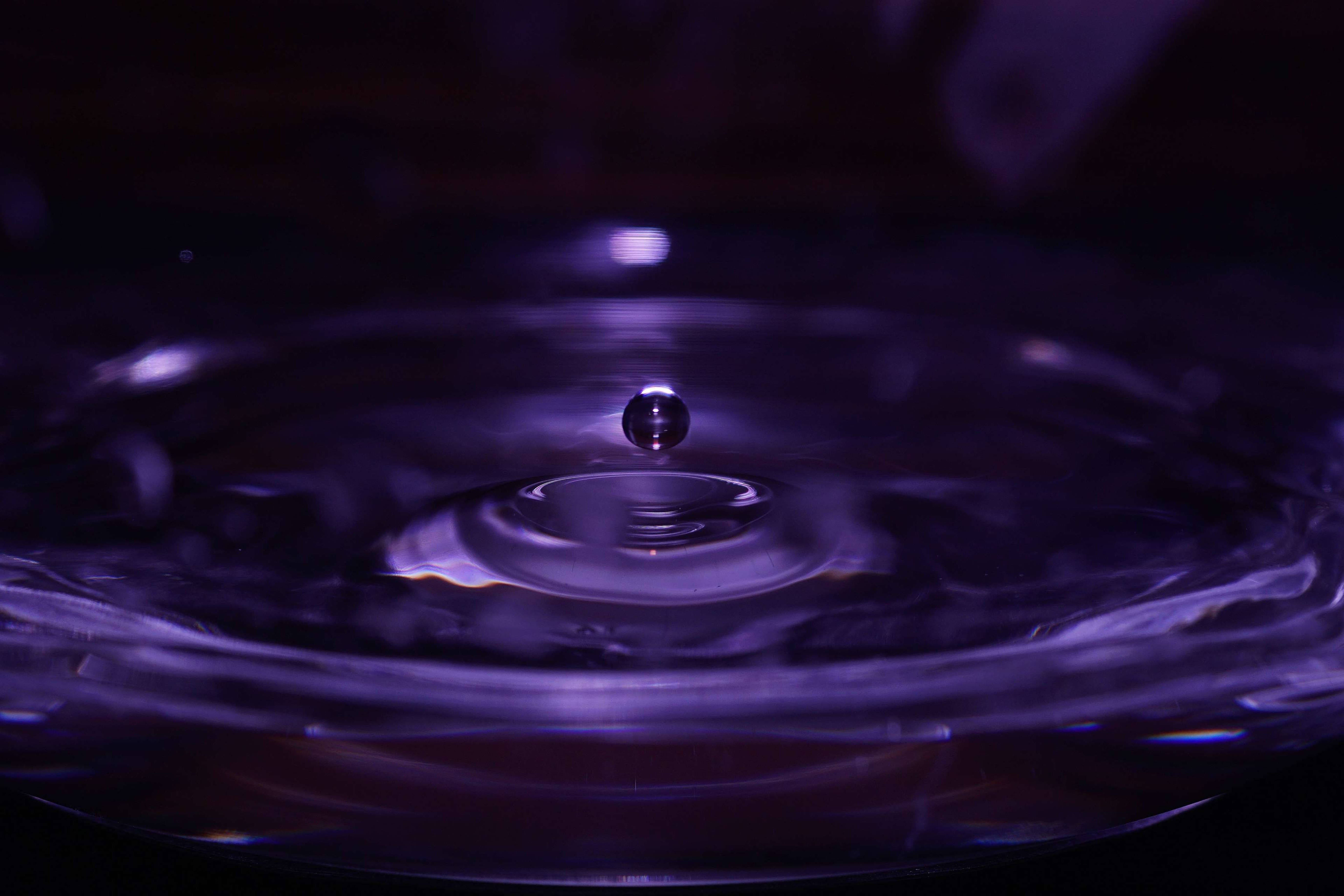 purple water ripple, concentric ripples, dark ambient setting, 5K Desktop Wallpaper