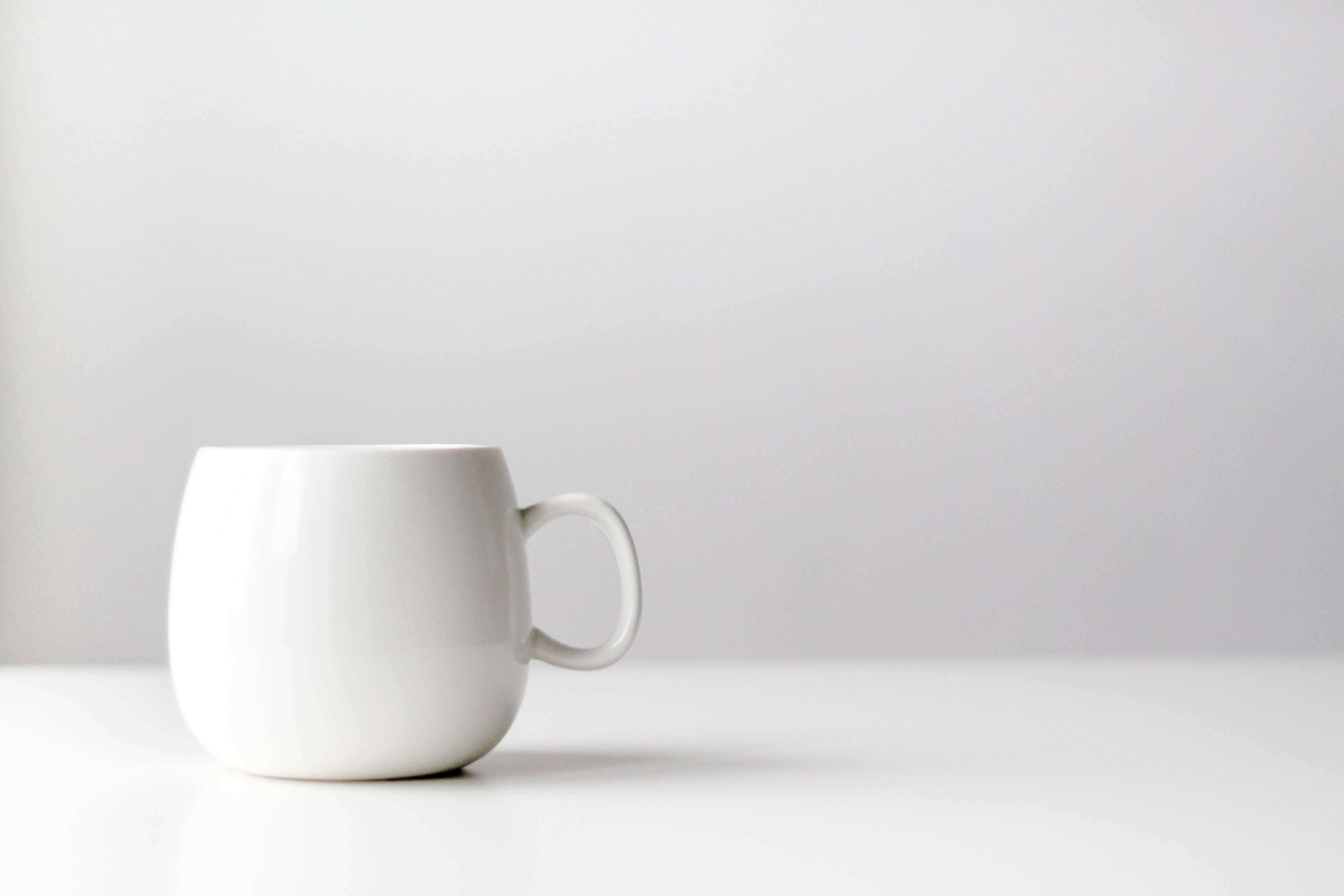 minimalist white mug, white ceramic mug, bright white surface, 4K Desktop Wallpaper