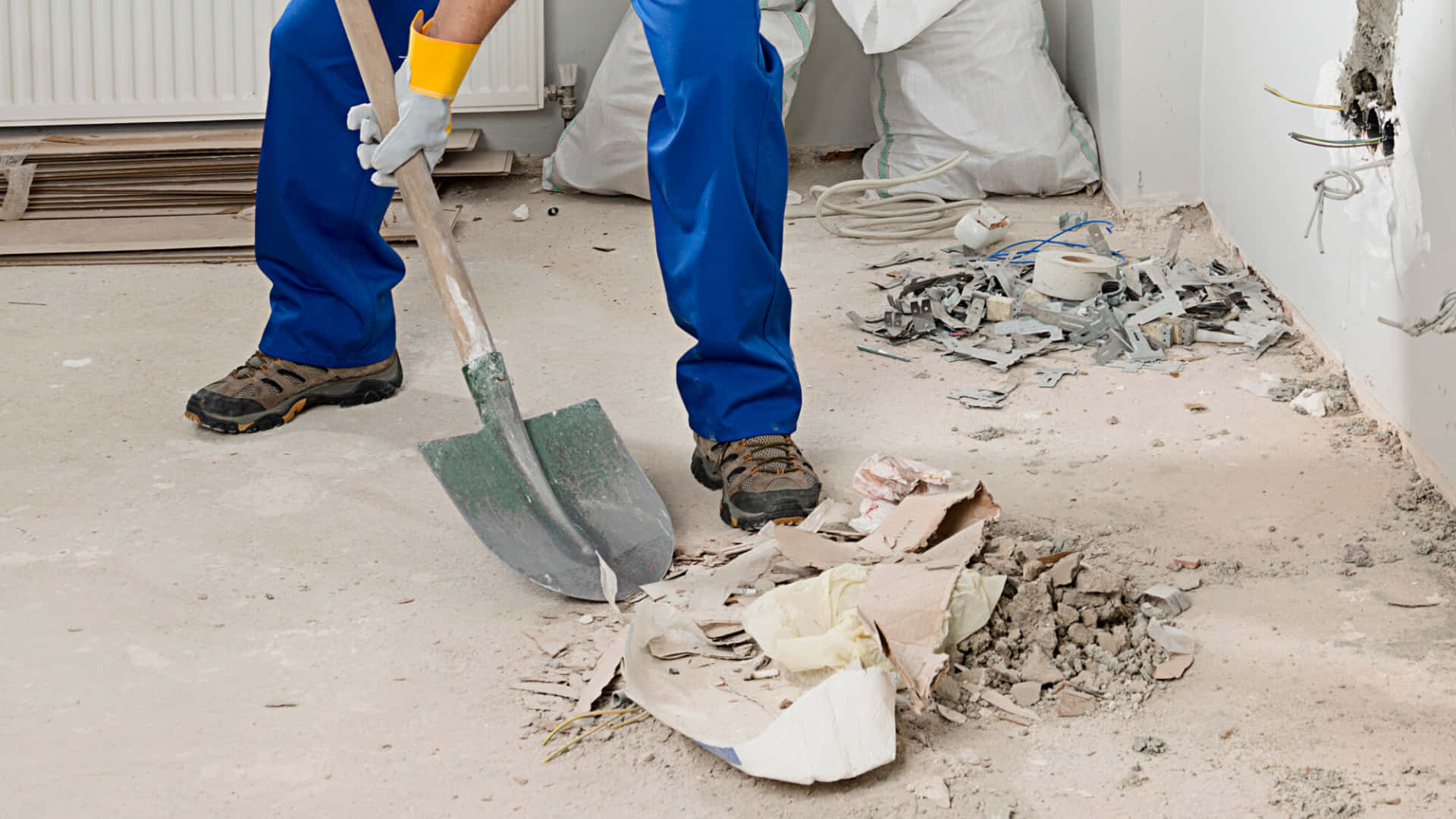 Cleaning Scraps Shovel, blue overalls, dusty demolition site, Full HD Desktop Wallpaper