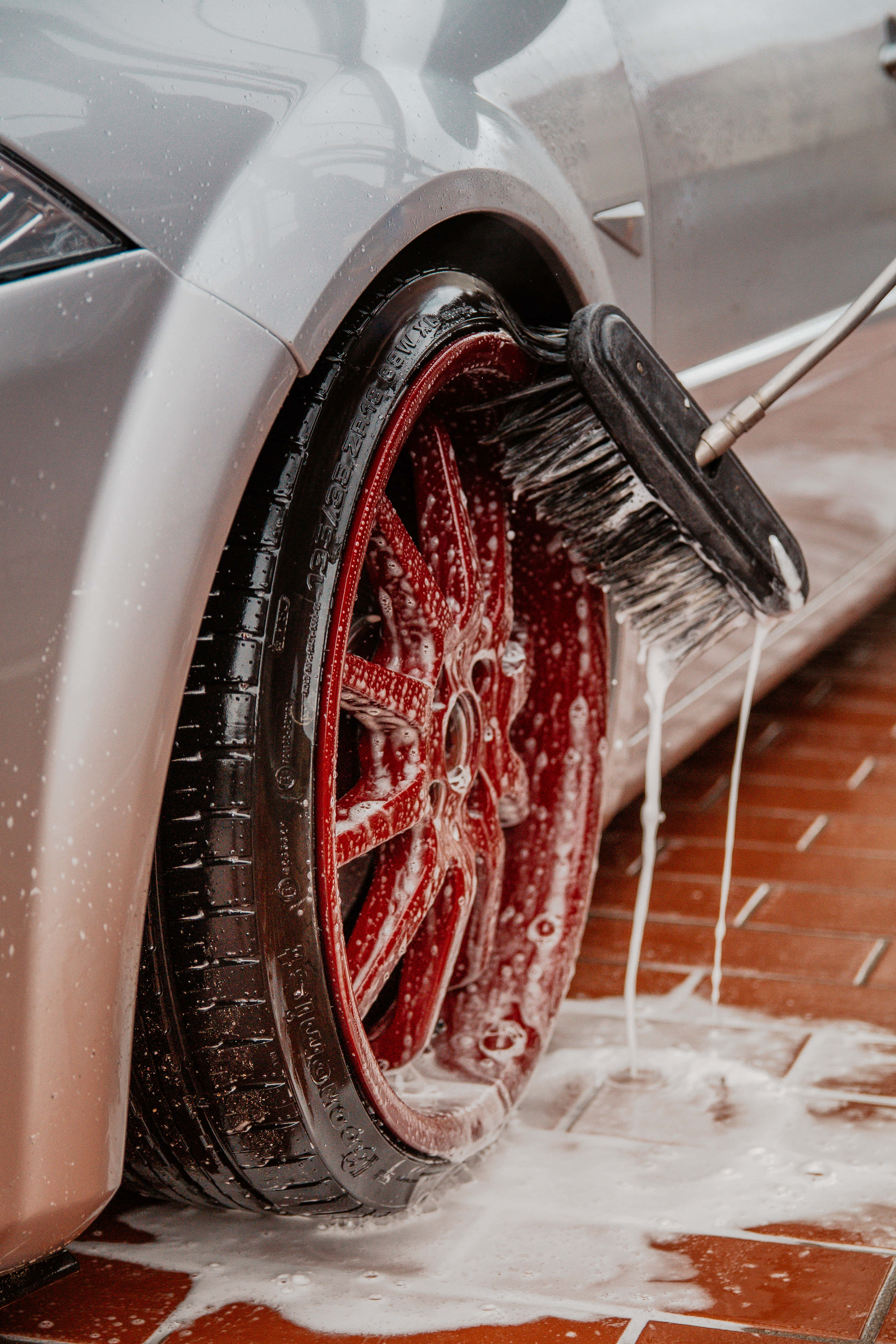 red wheel, silver car, wet tiled floor, 5K Phone Wallpaper