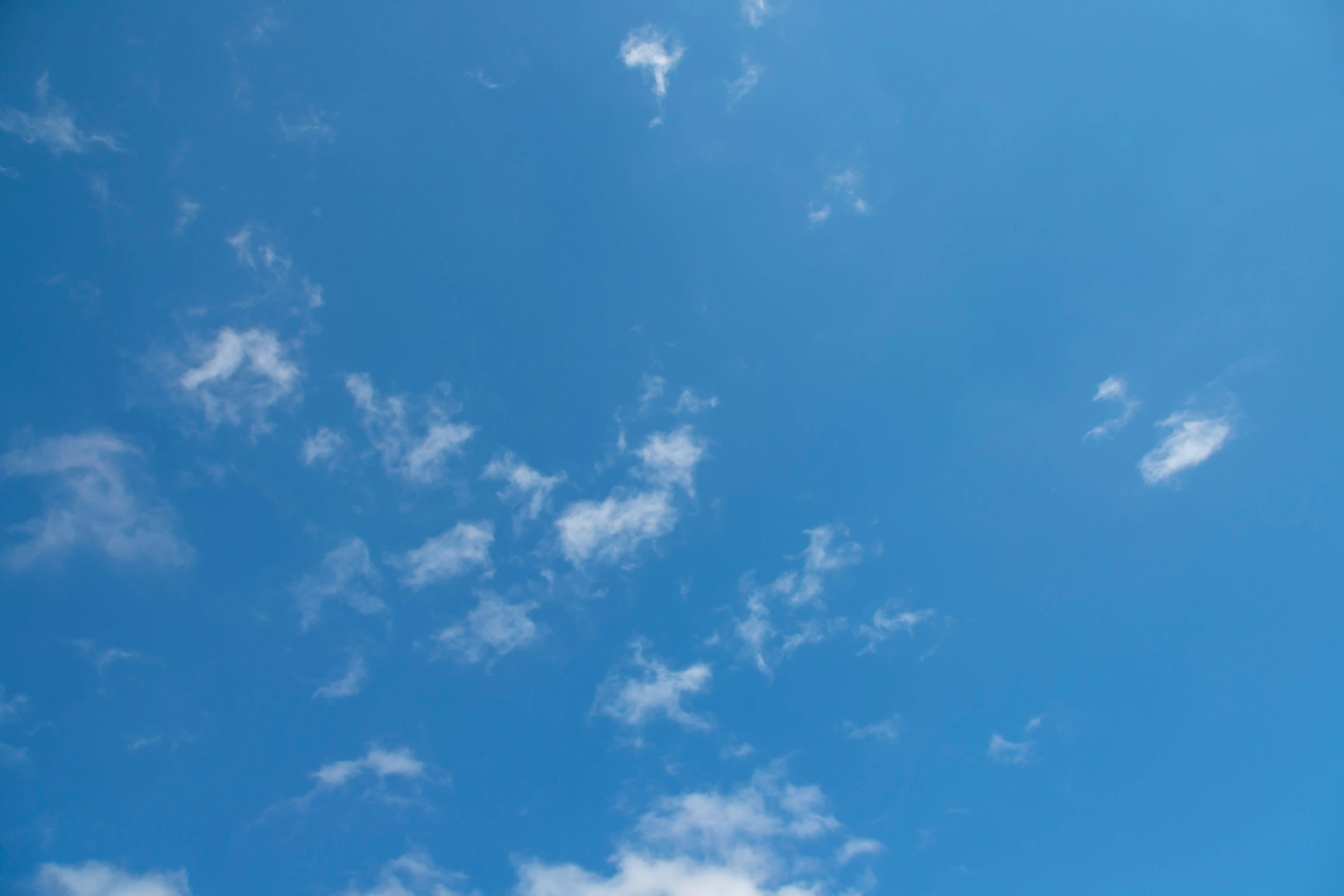 clear blue sky, wispy white clouds, drifting lazily, 4K Desktop Wallpaper