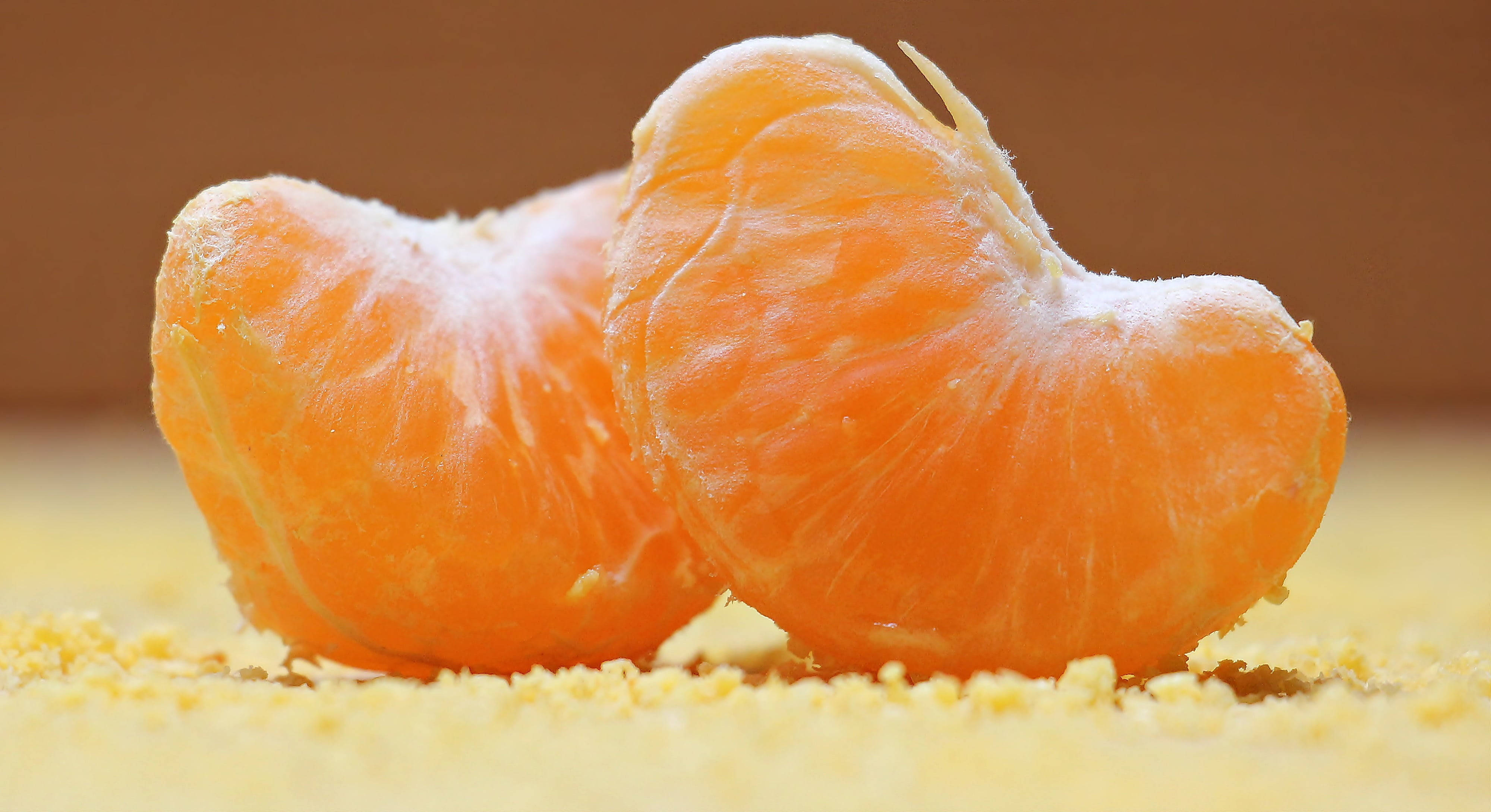 two peeled zest clementine citrus fruits, tangerine segments, fine yellow zest, 4K Desktop Wallpaper