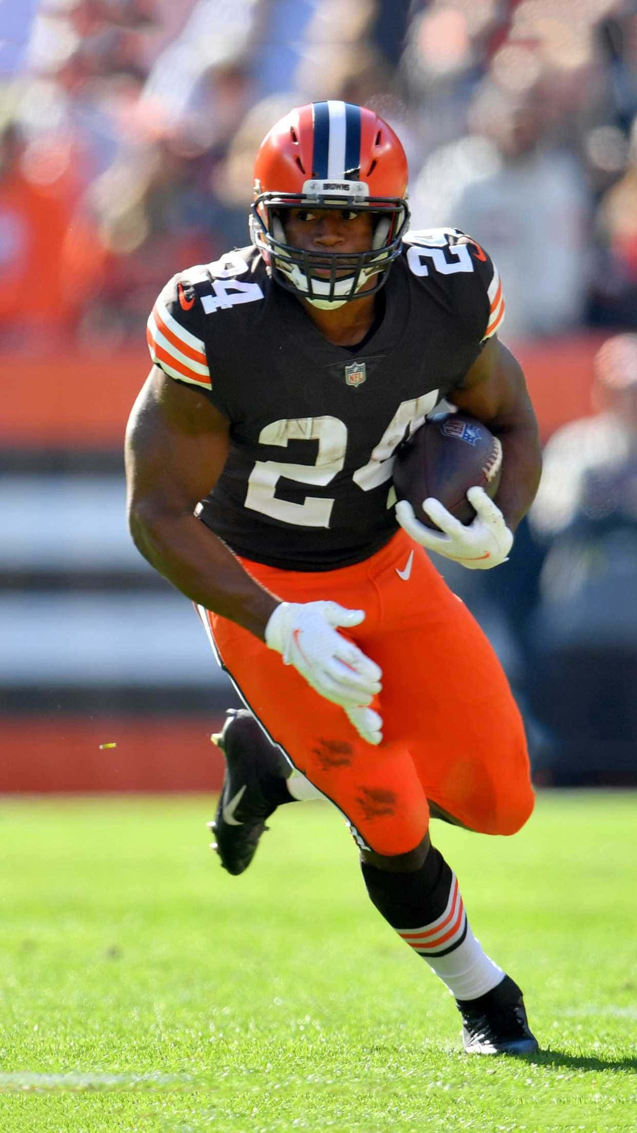 Cleveland Browns, black and orange uniform, football player, Full HD Phone Wallpaper