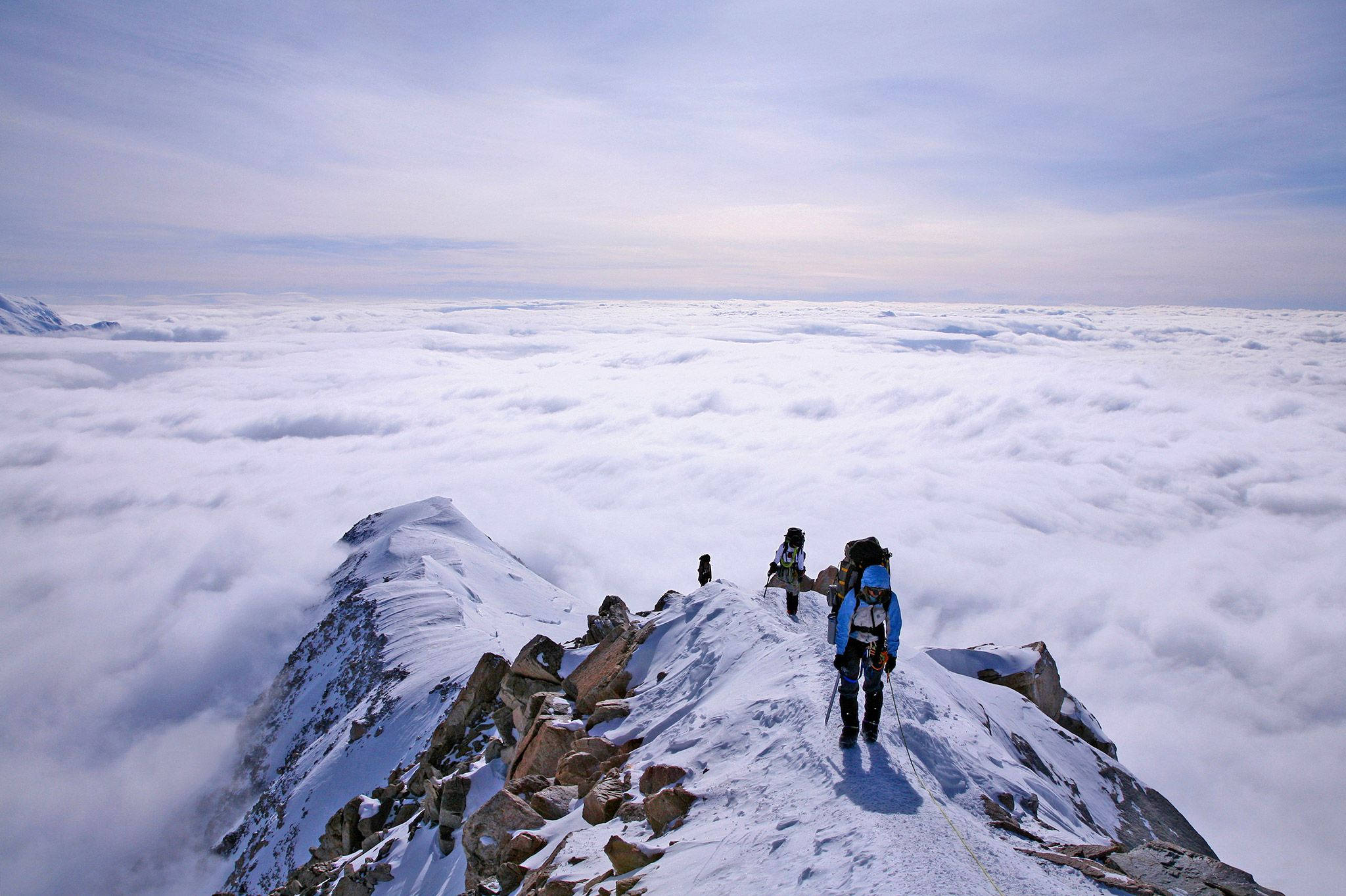 snowcapped mountain ridge, sea of clouds, pale blue sky, Full HD Desktop Wallpaper