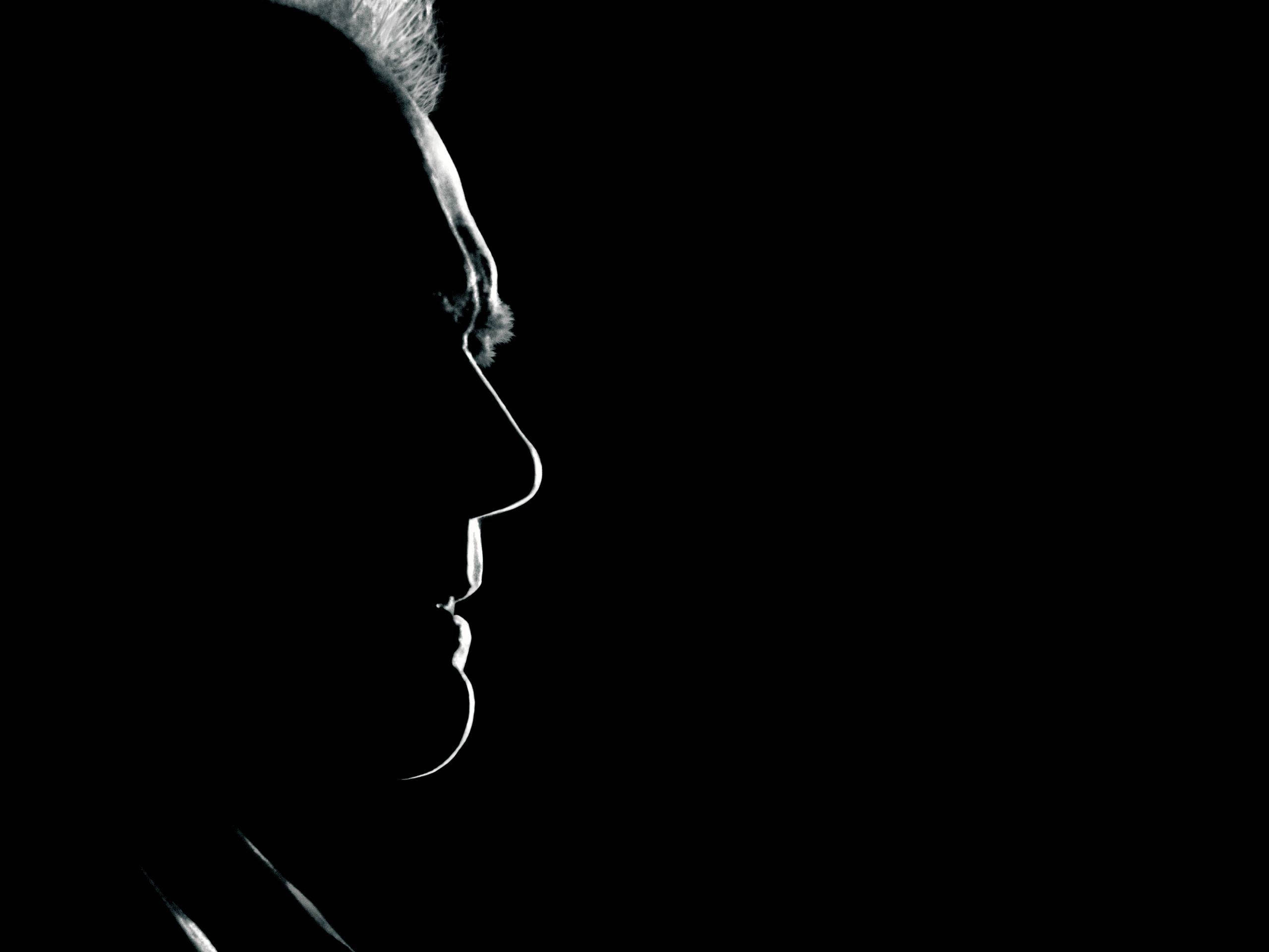 Clint Eastwood, shadowed profile, black and white silhouette, 2K Desktop Wallpaper