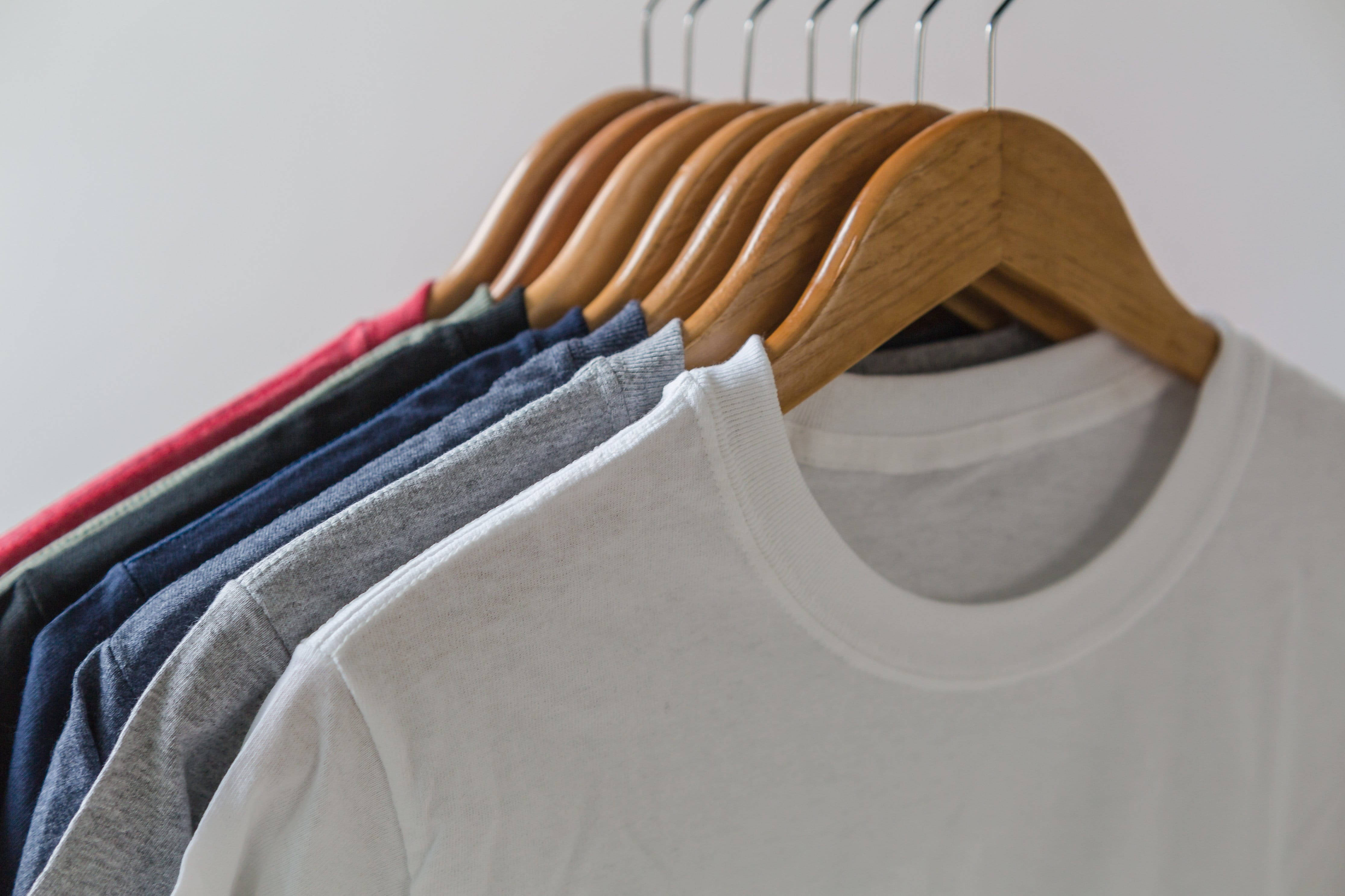 plain white wall, wooden hangers, colorful t-shirts, 4K Desktop Wallpaper