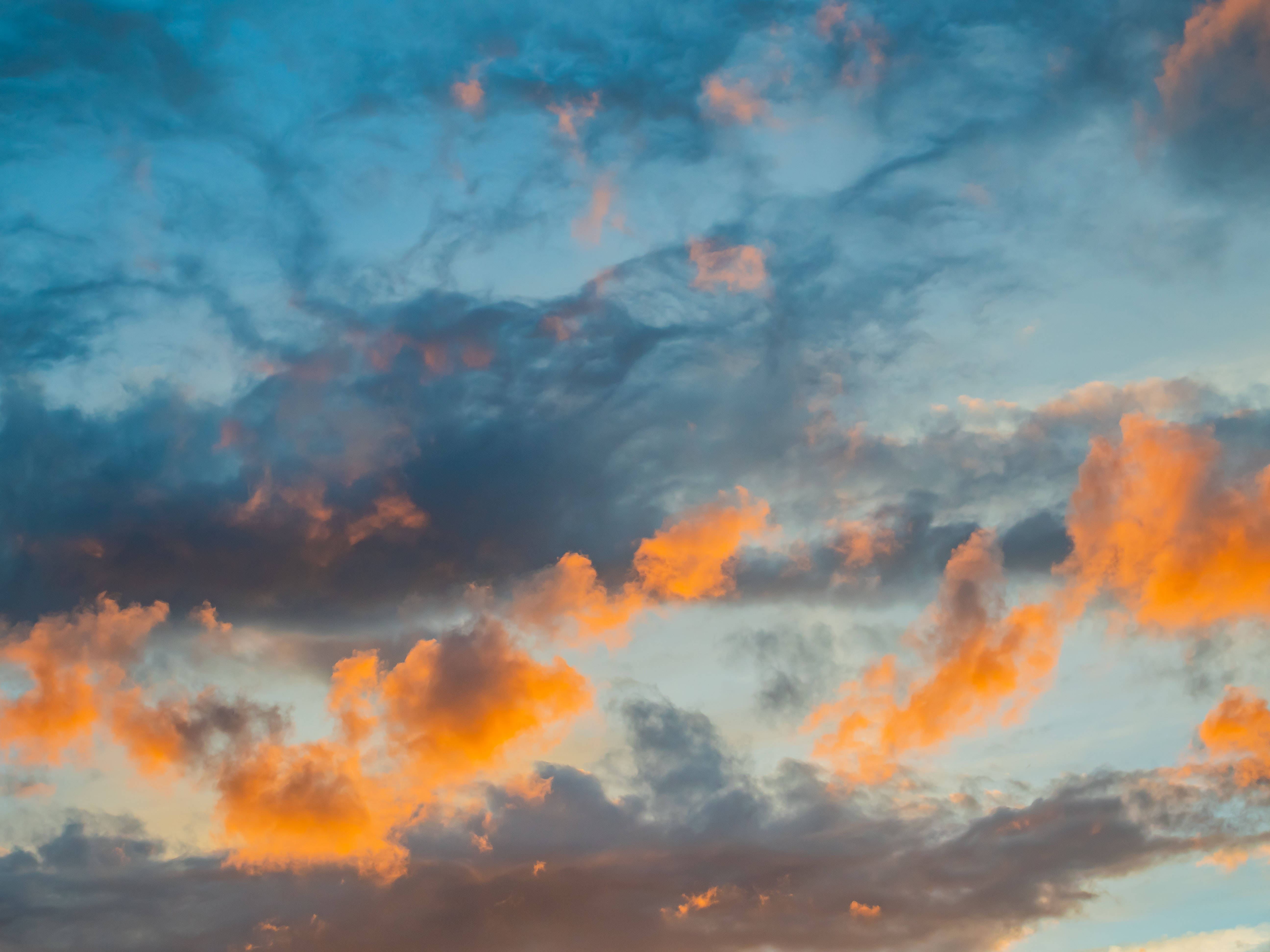 sunset, fiery orange clouds, deep blue storm clouds, 5K Desktop Wallpaper