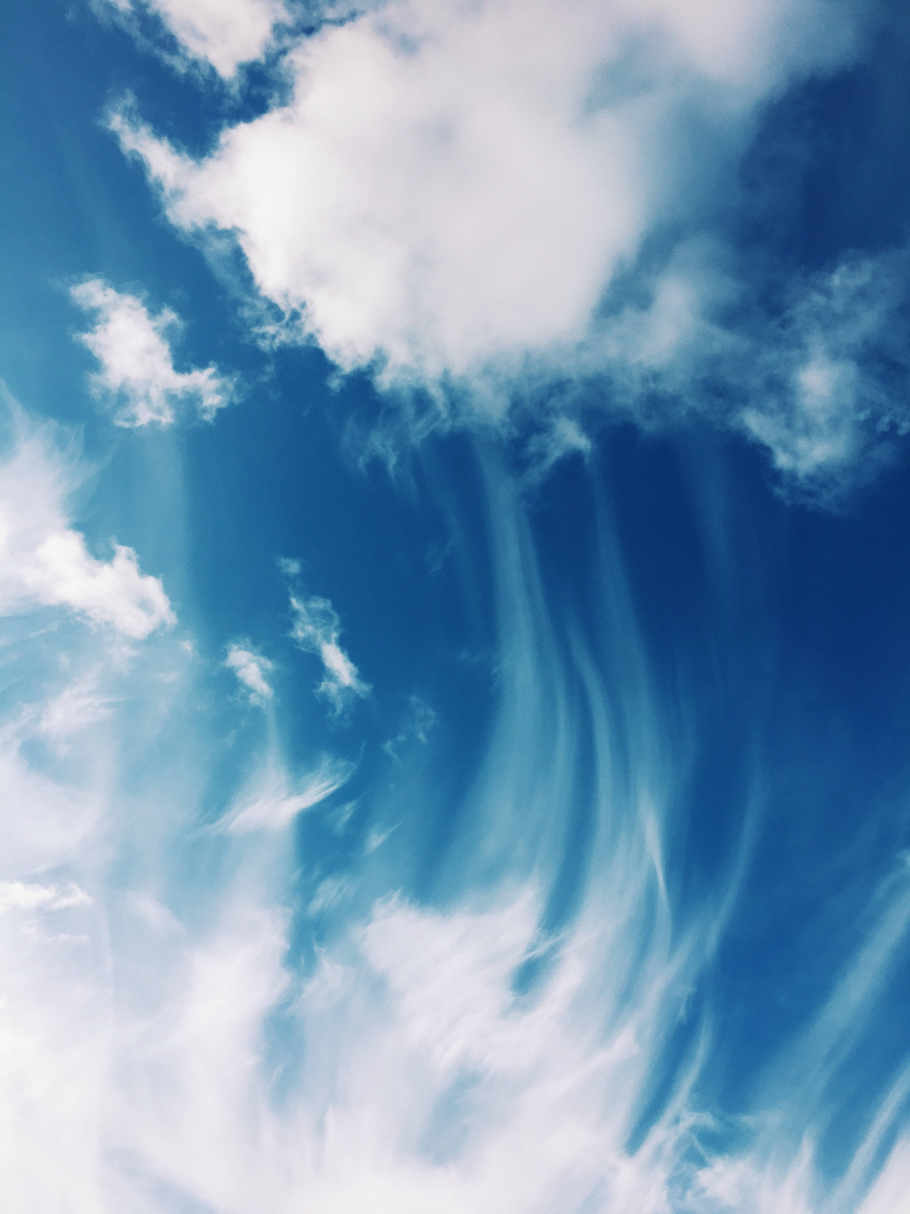 Wave Cloud iPhone, vibrant blue sky, wispy white clouds, 4K Phone Wallpaper